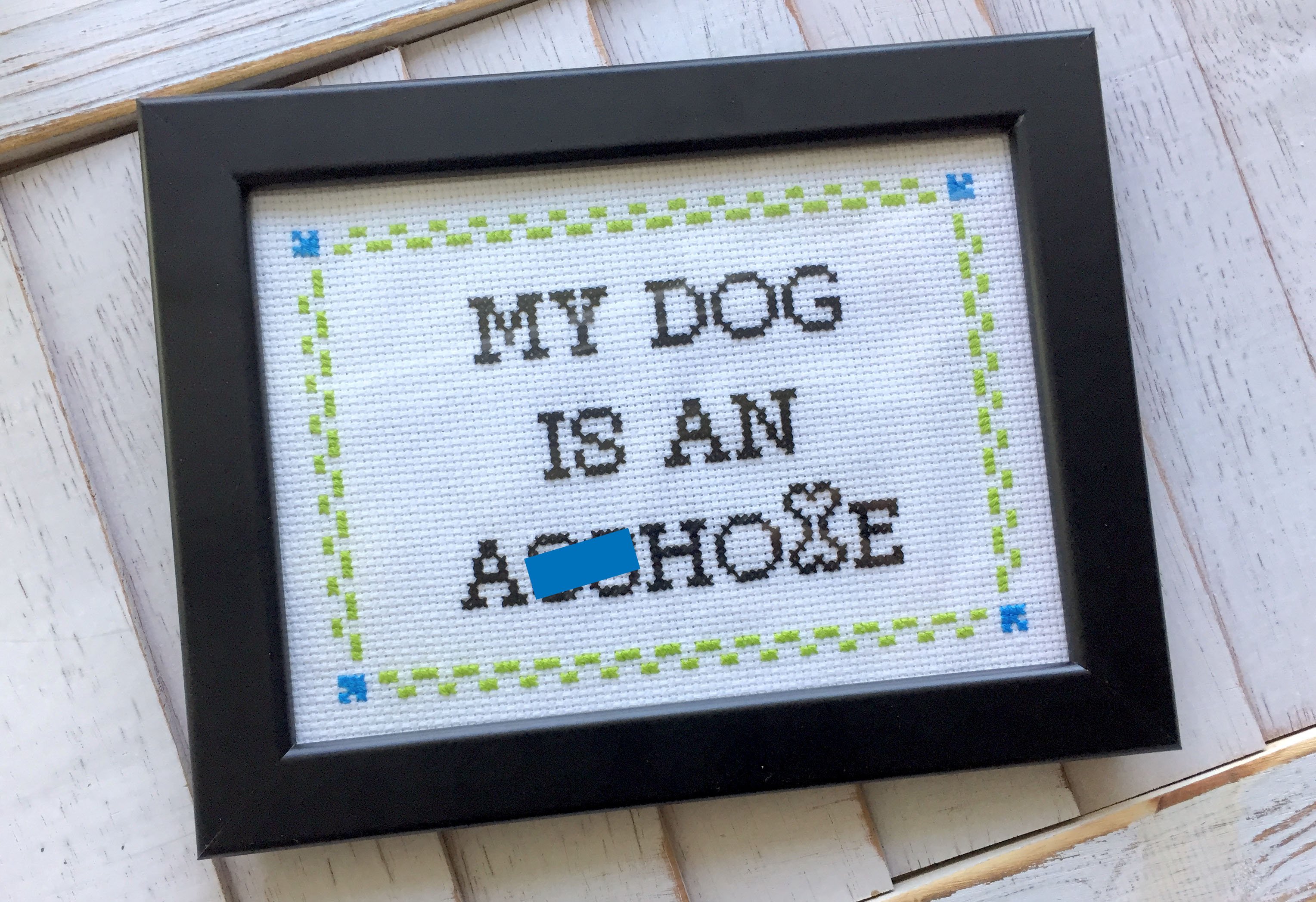 My DOG is an A**hole Cross Stitch DIY Kit featuring a humorous design for dog lovers, including all necessary materials for crafting.