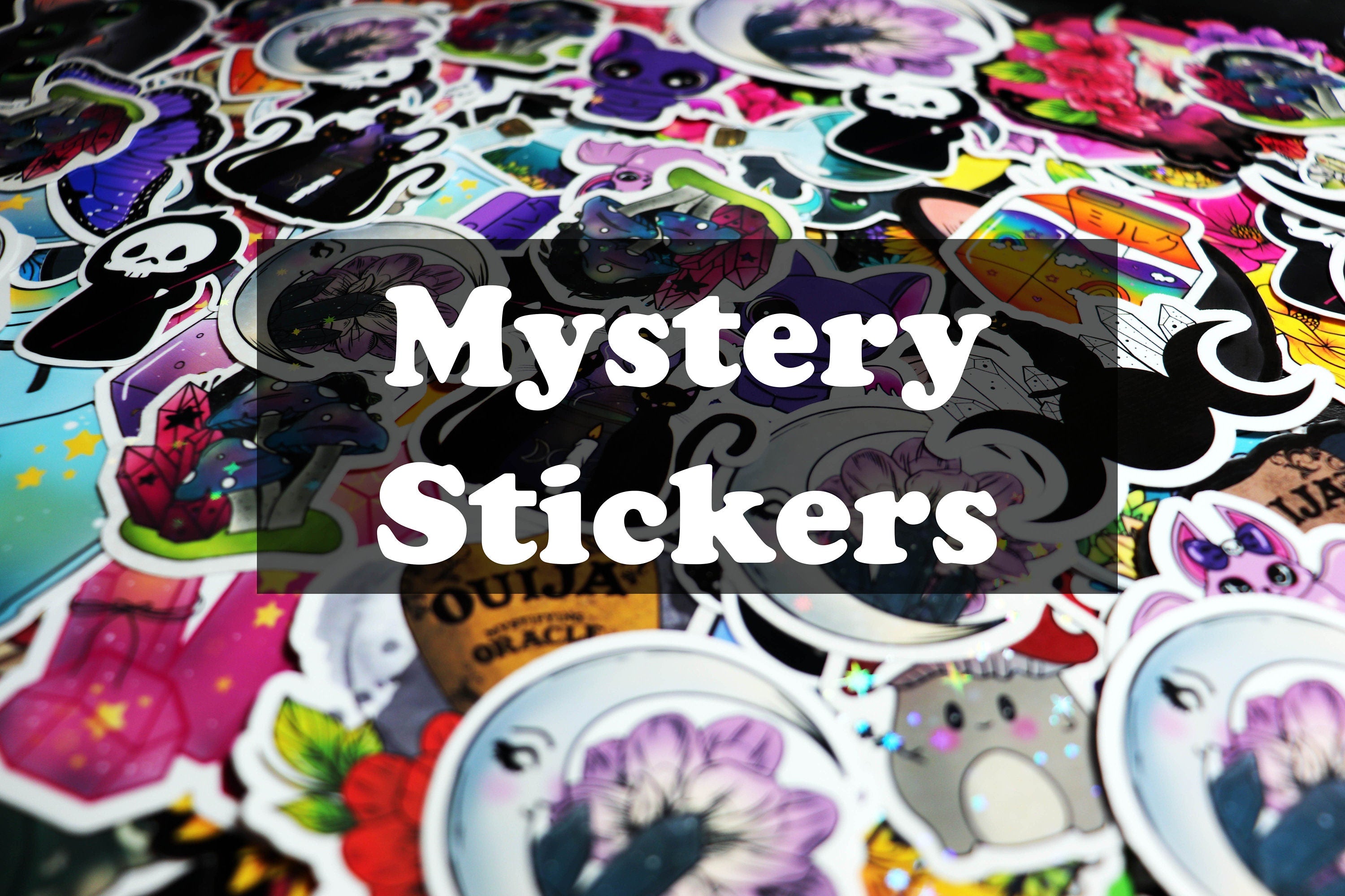 A colorful assortment of mystery stickers in various designs and sizes, showcasing high-quality matte vinyl and laminated finishes.