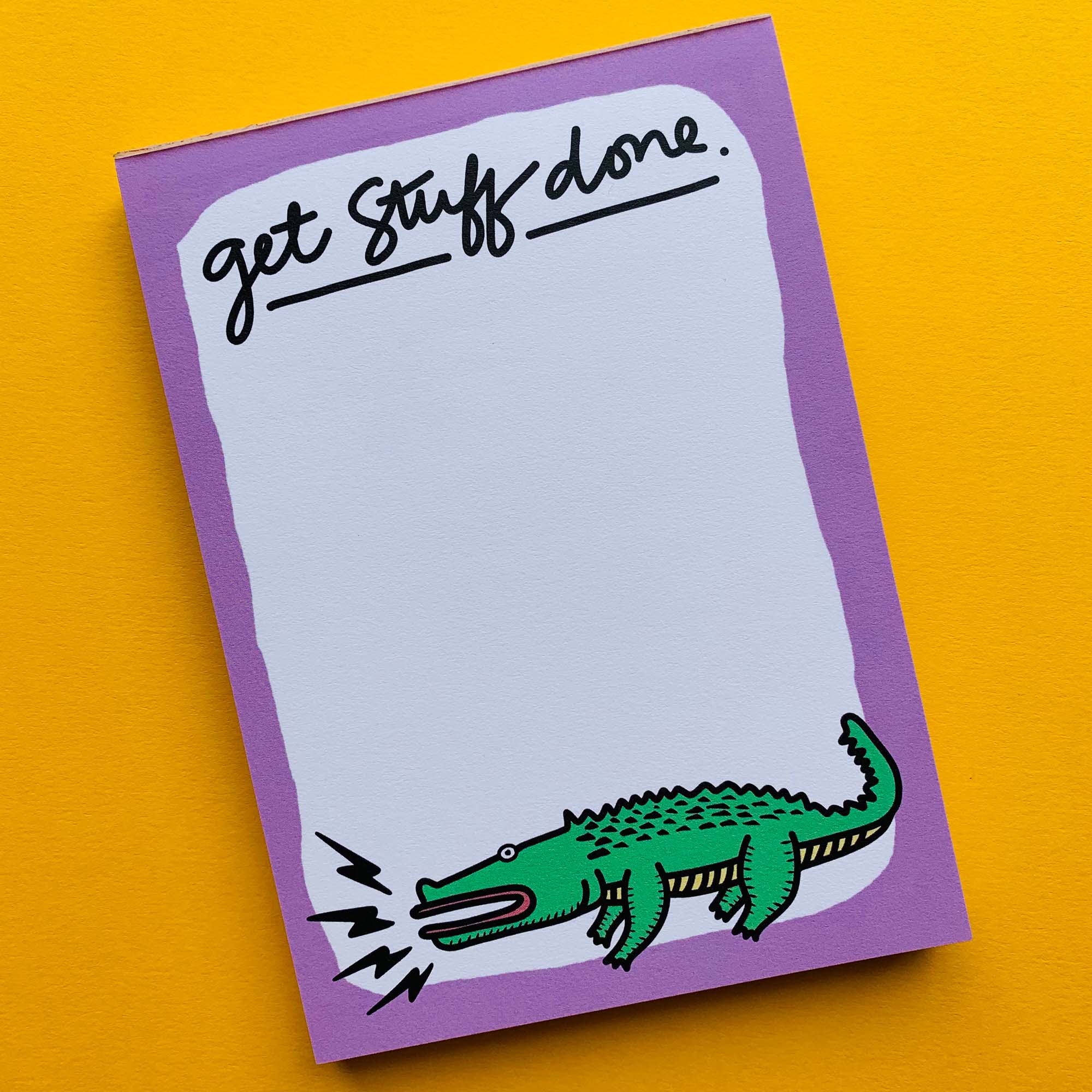 A cute alligator-themed notepad designed for to-do lists, featuring 100 pages of uncoated paper in a compact 5x7 size.