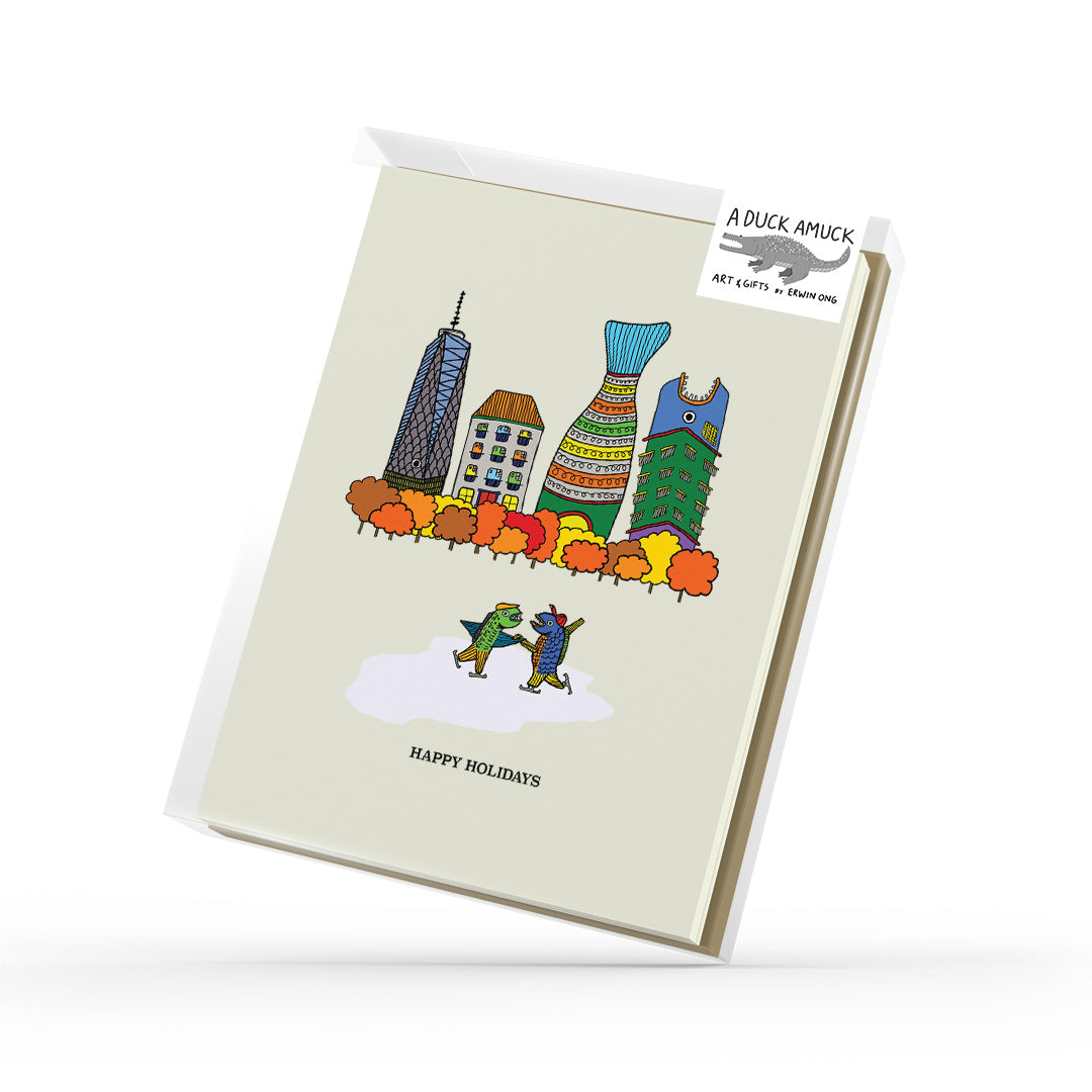 NYC Christmas greeting card featuring two fish ice skating with a festive New York City skyline in the background.