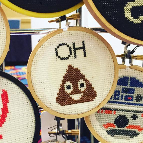 Oh Poop Emoji Counted Cross Stitch DIY Kit with supplies including fabric, threads, and hoop.