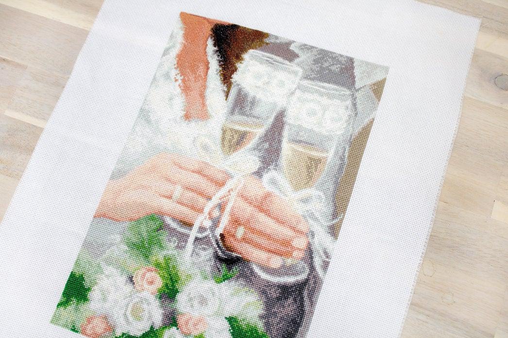 Only Together B2334L Counted Cross-Stitch Kit featuring a romantic wedding design with a couple, flowers, rings, and champagne.