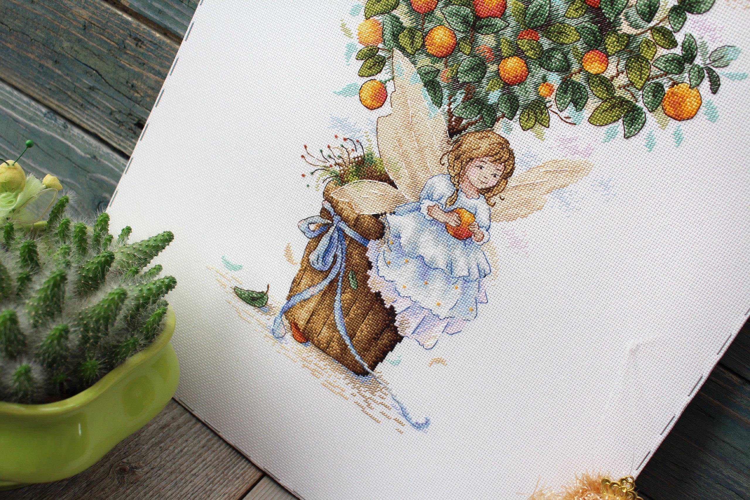 Orange Fairy SNV-652 Counted Cross Stitch Kit featuring vibrant threads and AIDA canvas.