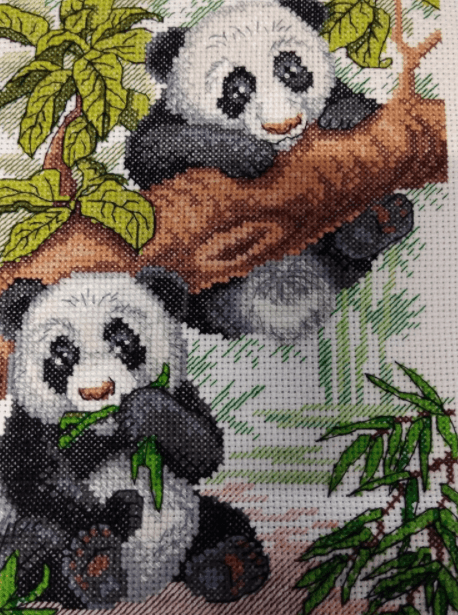 Pandas SM-050 Counted Cross Stitch Kit featuring 14 count AIDA canvas, cotton threads, and a needle, designed by Anzhelika Ivanova.