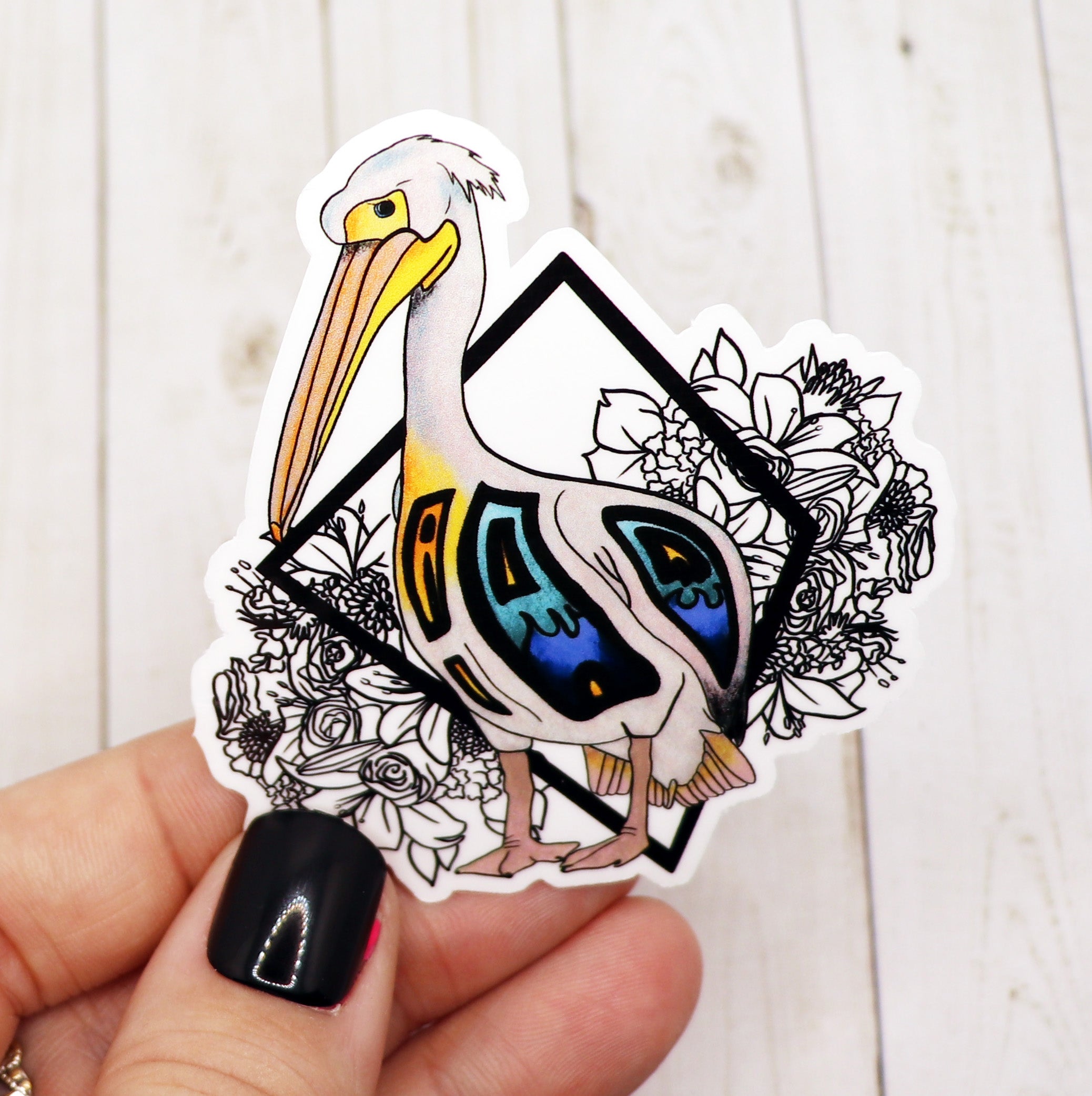 A colorful Pelican Sticker on a white background, showcasing its vibrant design and matte finish.