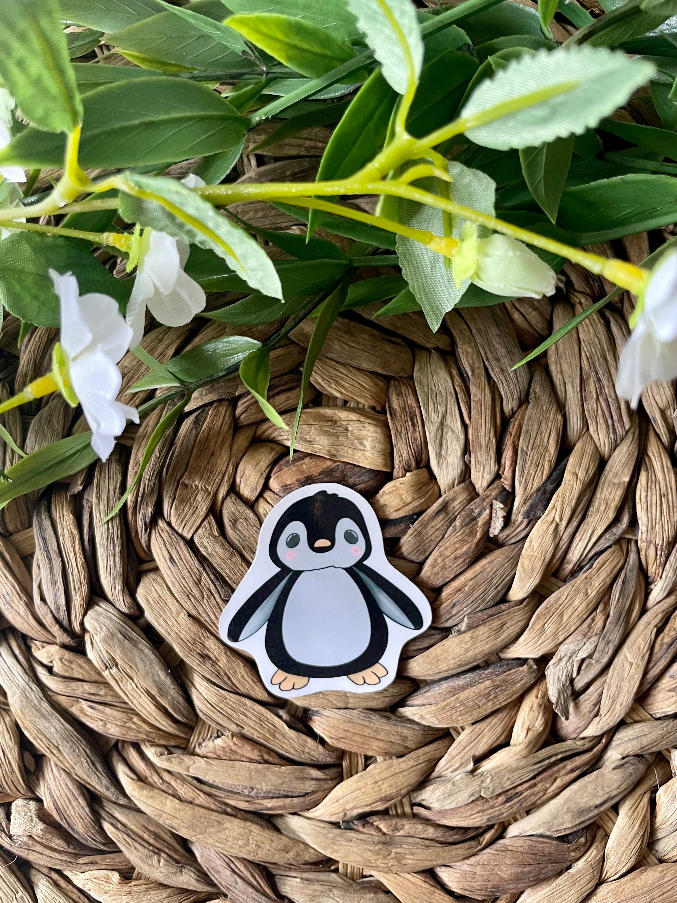 A cute penguin sticker designed for customization, featuring a vibrant penguin illustration on a waterproof background.