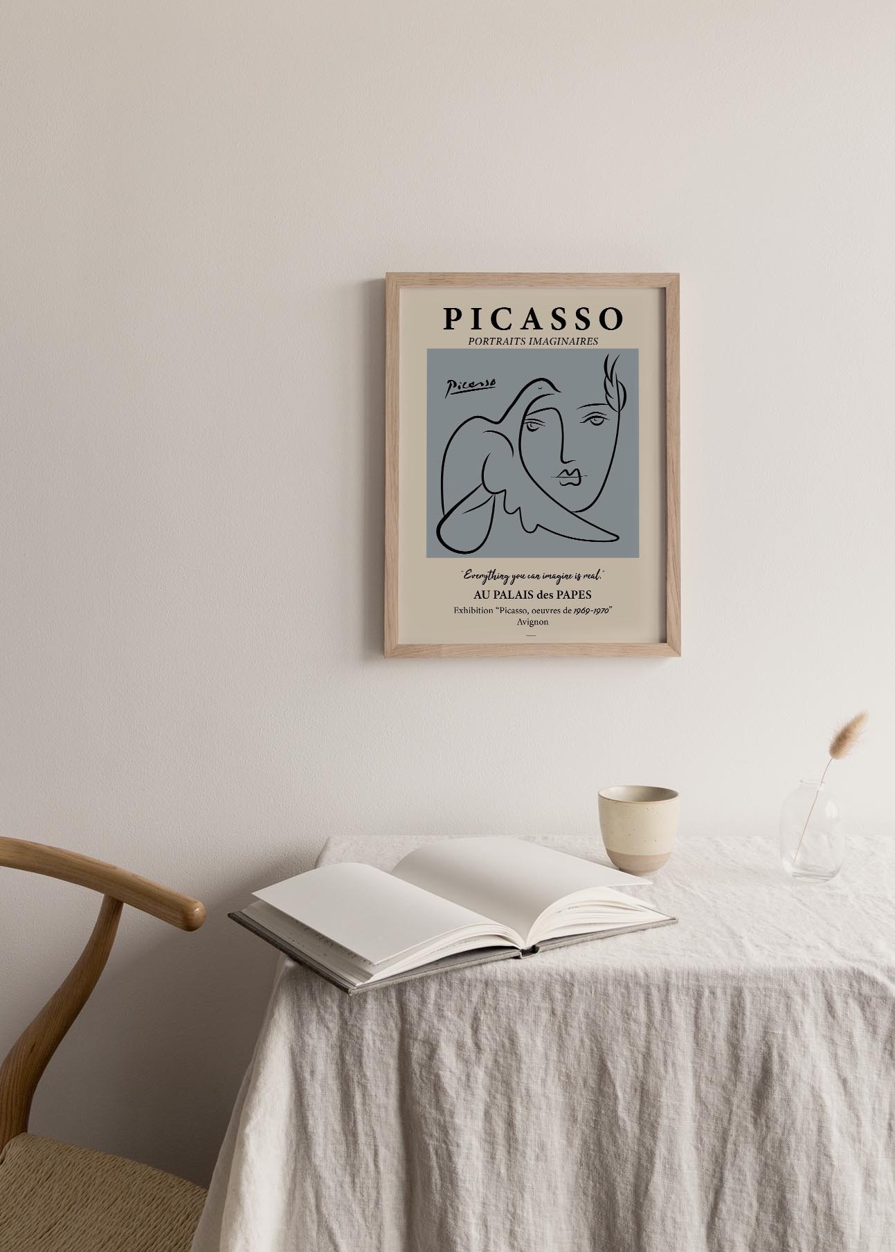 A vibrant blue poster featuring Picasso's iconic Man and Dove artwork, showcasing intricate details and rich colors.