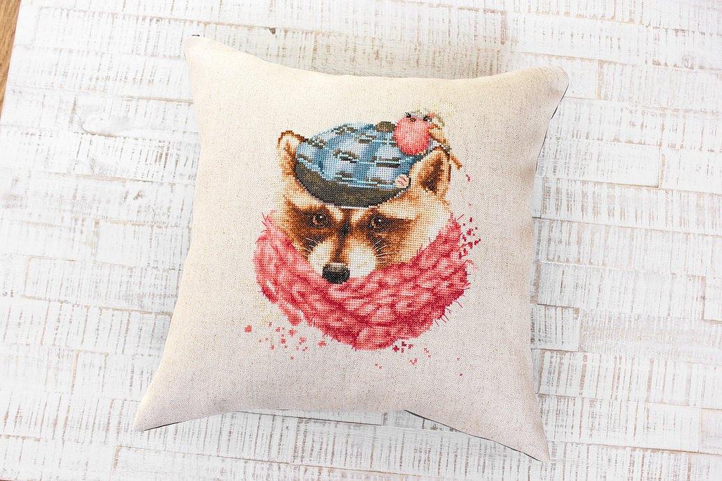 Pillow PB157L Counted Cross-Stitch Kit featuring colorful threads, canvas, and needle for crafting.