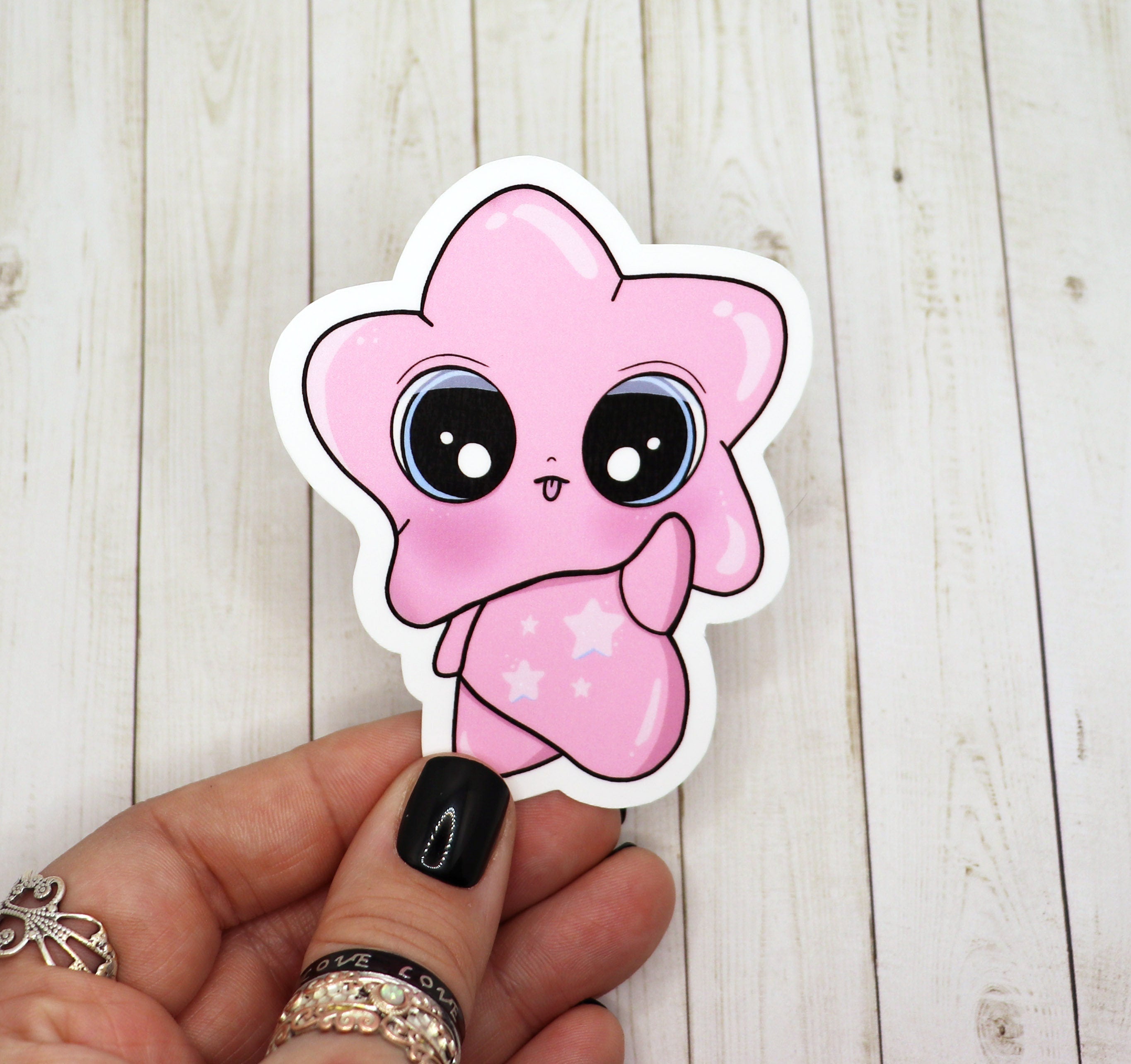 A vibrant Pink Star Baby Sticker on a white background, showcasing its 3-inch size and matte finish.