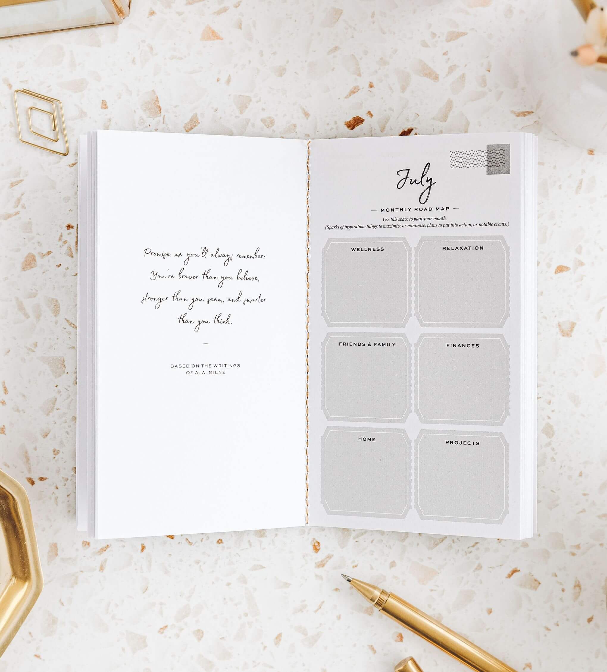 Ponderlily Monthly Planner 2023 in stone color, featuring a compact design with inspirational quotes and eco-friendly materials.