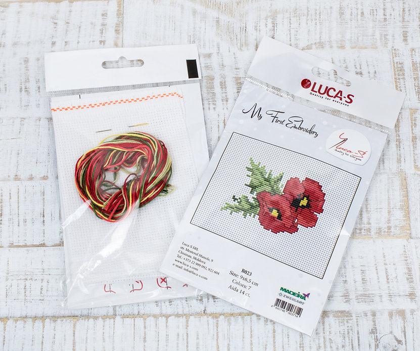 Poppies B023L Counted Cross-Stitch Kit with Aida canvas, Anchor threads, and needle, showcasing vibrant colors and detailed design.