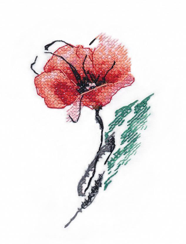 Poppy 1419 Counted Cross Stitch Kit with threads, needle, and canvas displayed on a table.