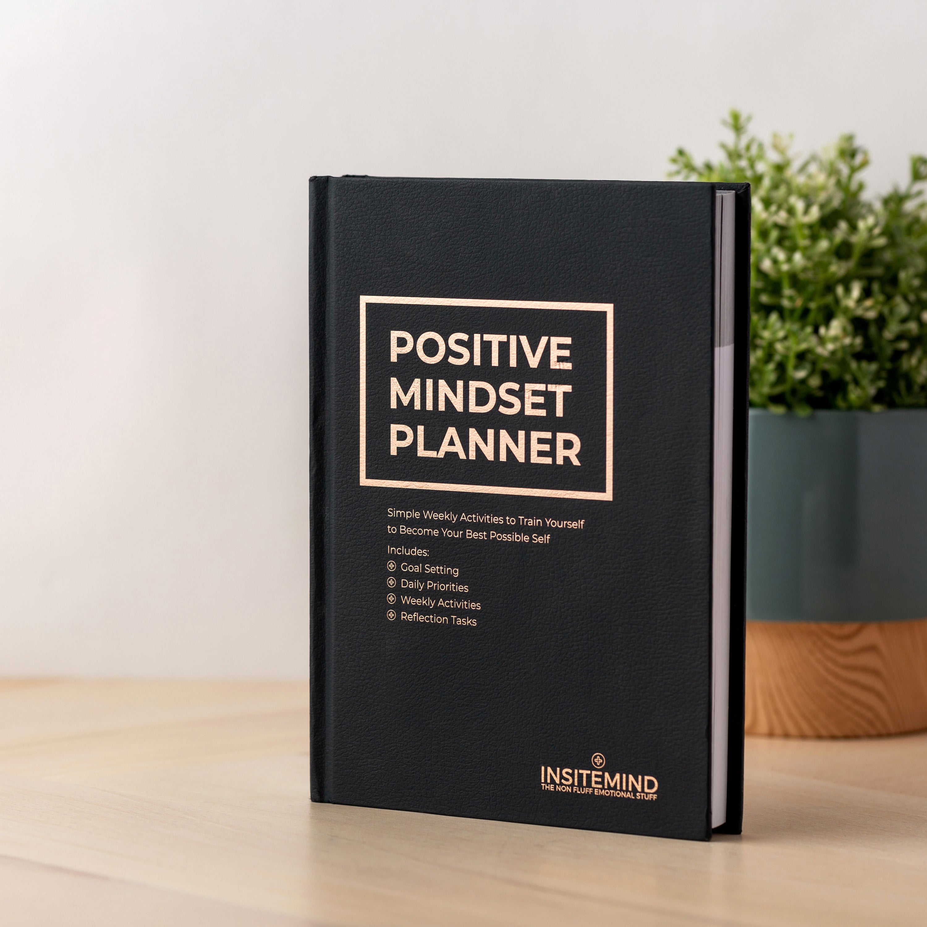 A beautifully designed Positive Mindset Planner featuring colorful pages and motivational quotes, perfect for organizing tasks and fostering positivity.