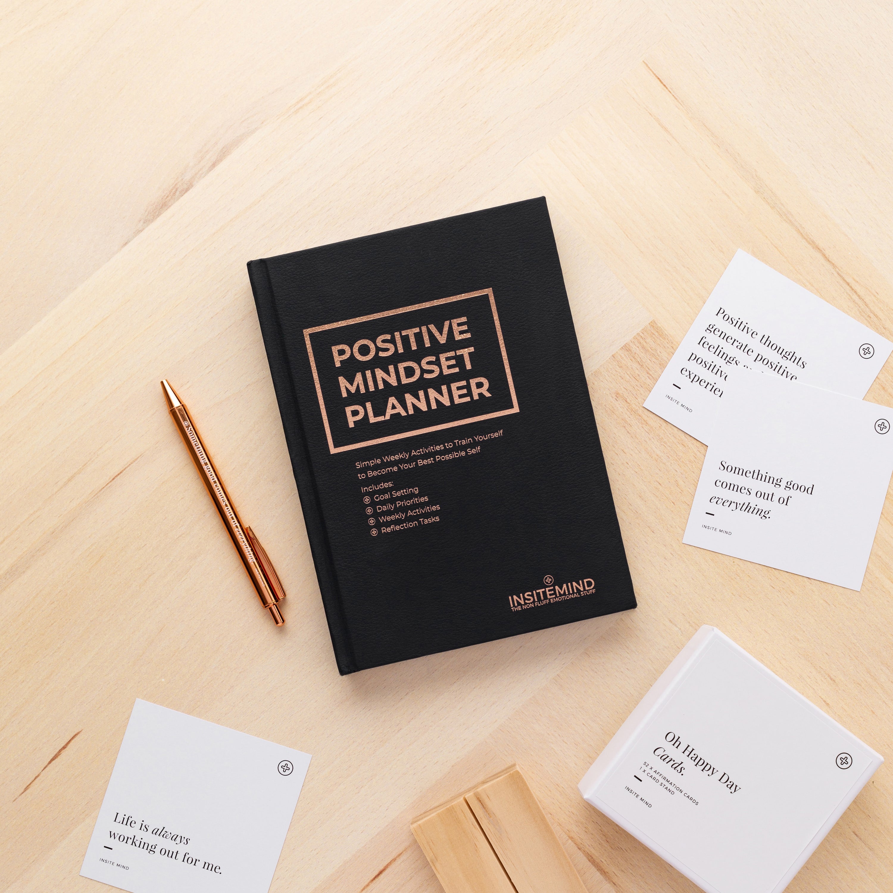 A beautifully designed Positive Mindset Planner featuring colorful pages and motivational quotes, perfect for organizing tasks and fostering positivity.