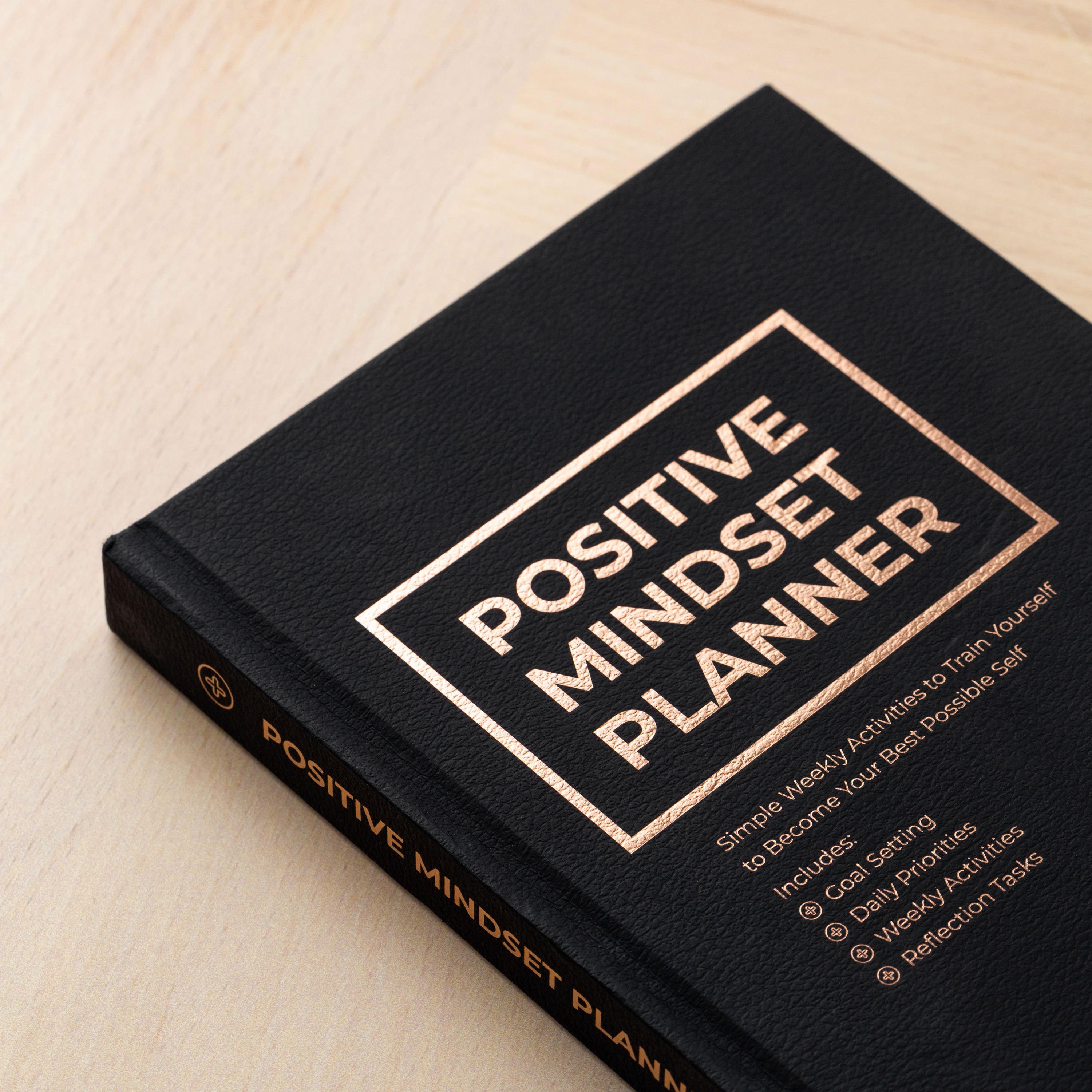 A beautifully designed Positive Mindset Planner featuring colorful pages and motivational quotes, perfect for organizing tasks and fostering positivity.