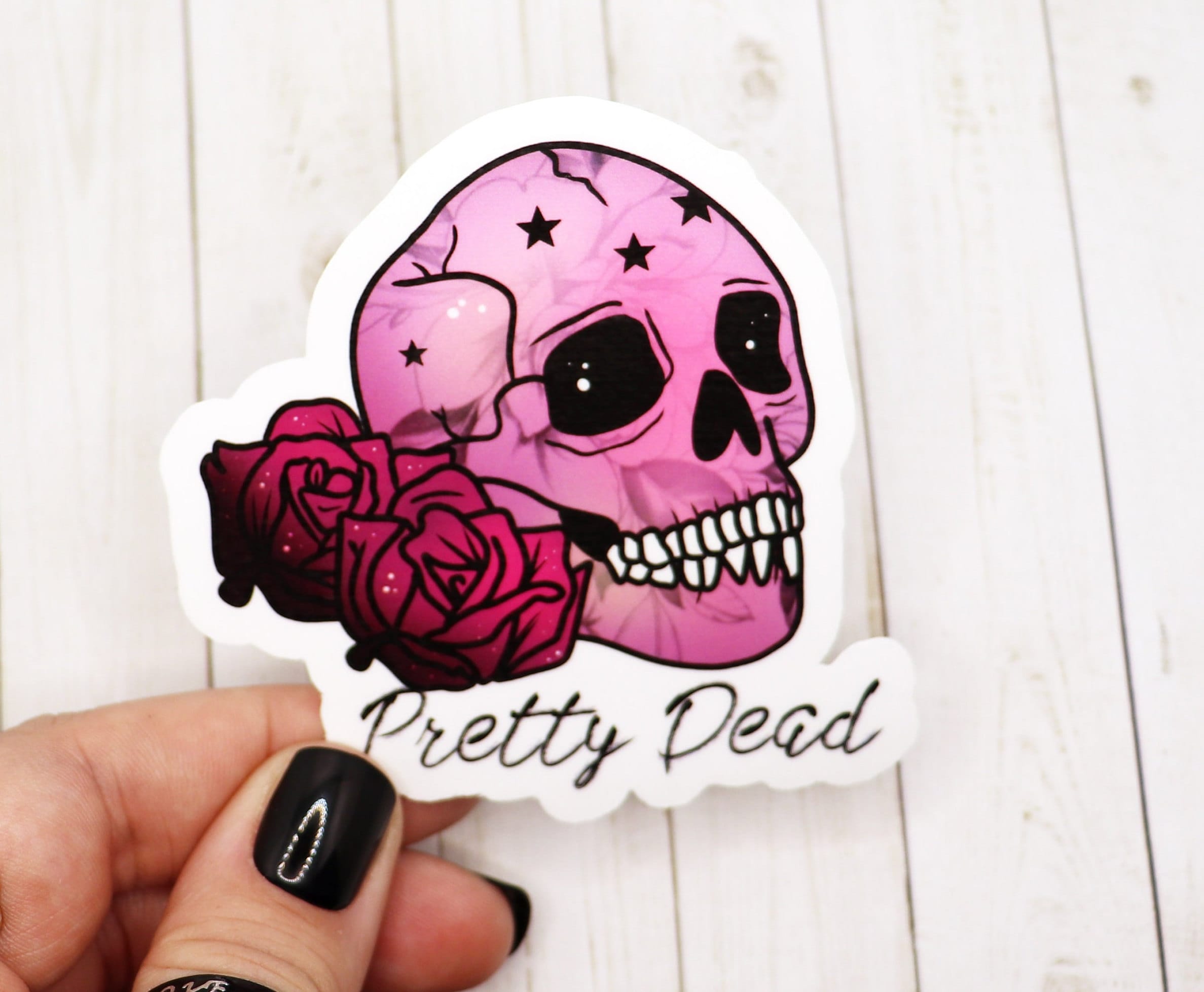 Pretty Dead Skull Vinyl Sticker featuring a unique skull design on matte vinyl, ideal for personalizing various items.