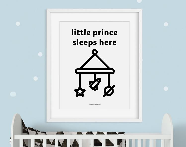 A charming wall art print featuring the phrase 'Prince Sleeps Here', designed for children's rooms, showcasing high-quality colors and details.