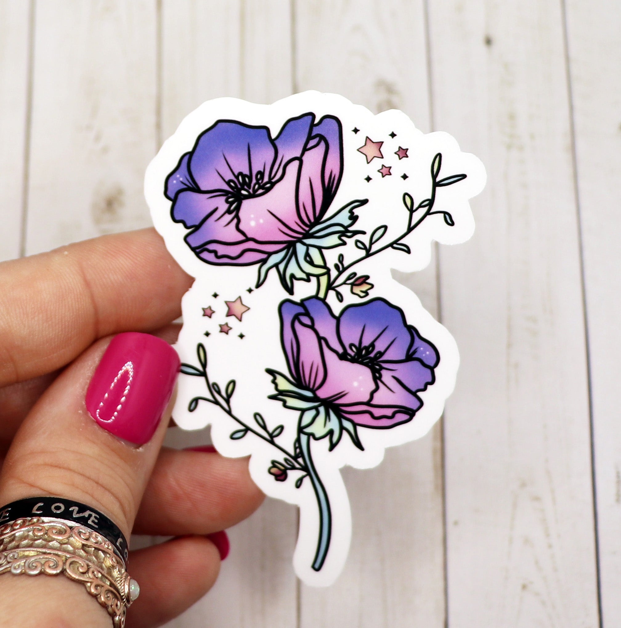 A vibrant purple flower sticker on a white background, showcasing its intricate design and matte finish.