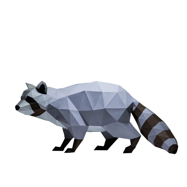 A detailed 3D papercraft raccoon model in grayscale tones, crouched in a sneaky position, showcasing its intricate design and sturdy paper material.