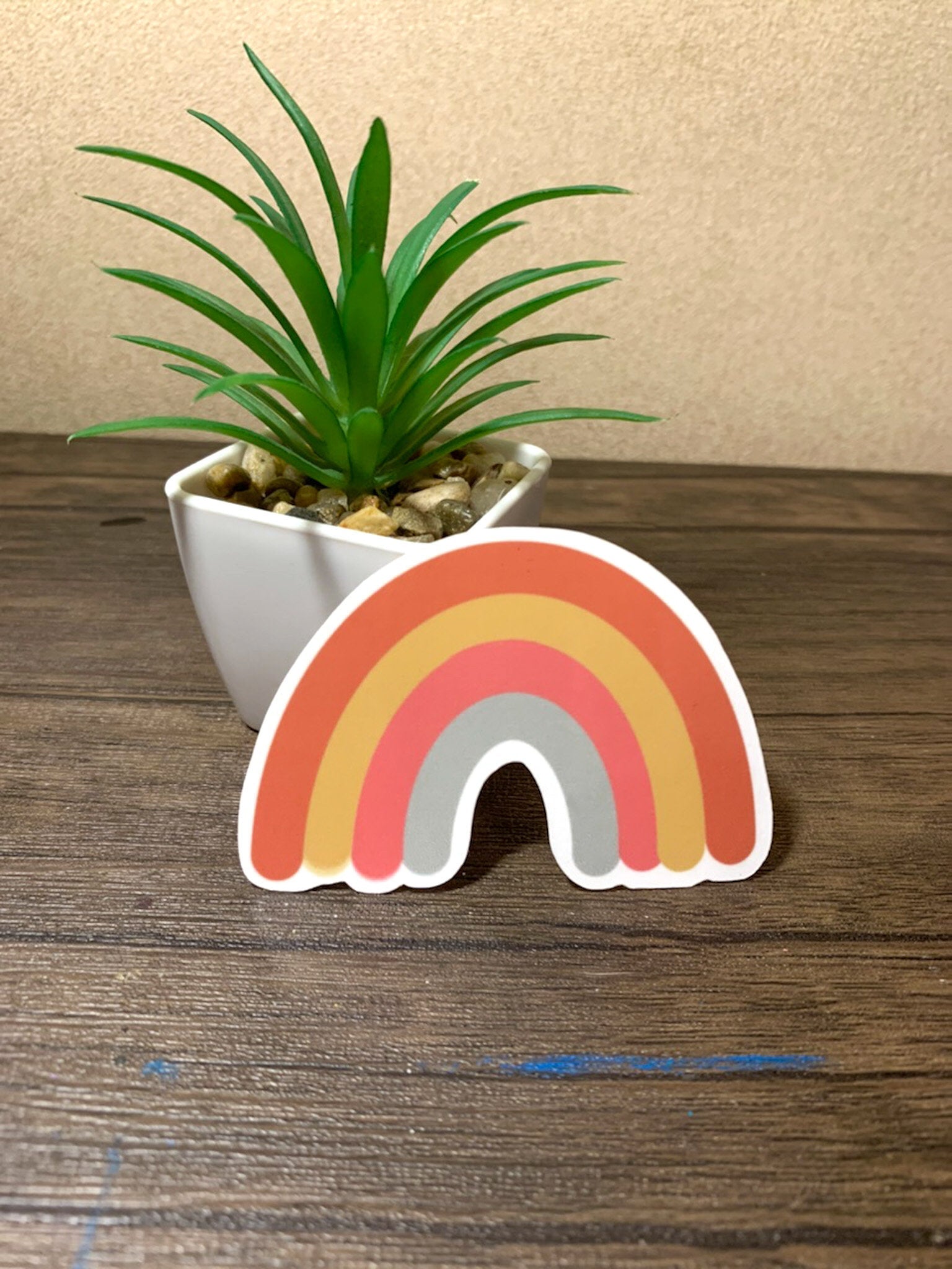 A colorful rainbow sticker designed for customization, featuring vibrant colors and a cute aesthetic, ideal for hydroflasks and laptops.