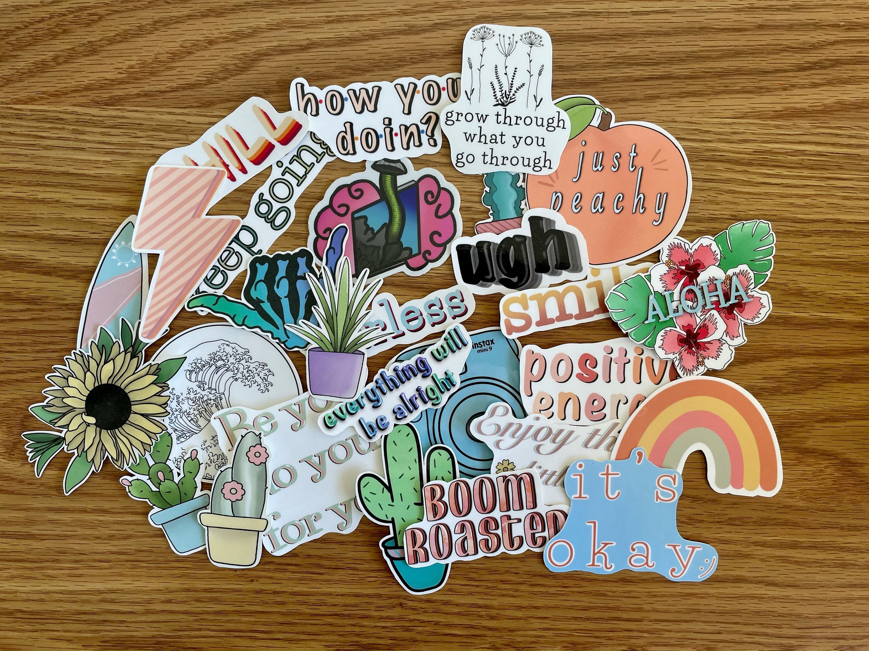 A colorful assortment of random stickers in a pack, showcasing various designs and patterns, perfect for personalizing items.