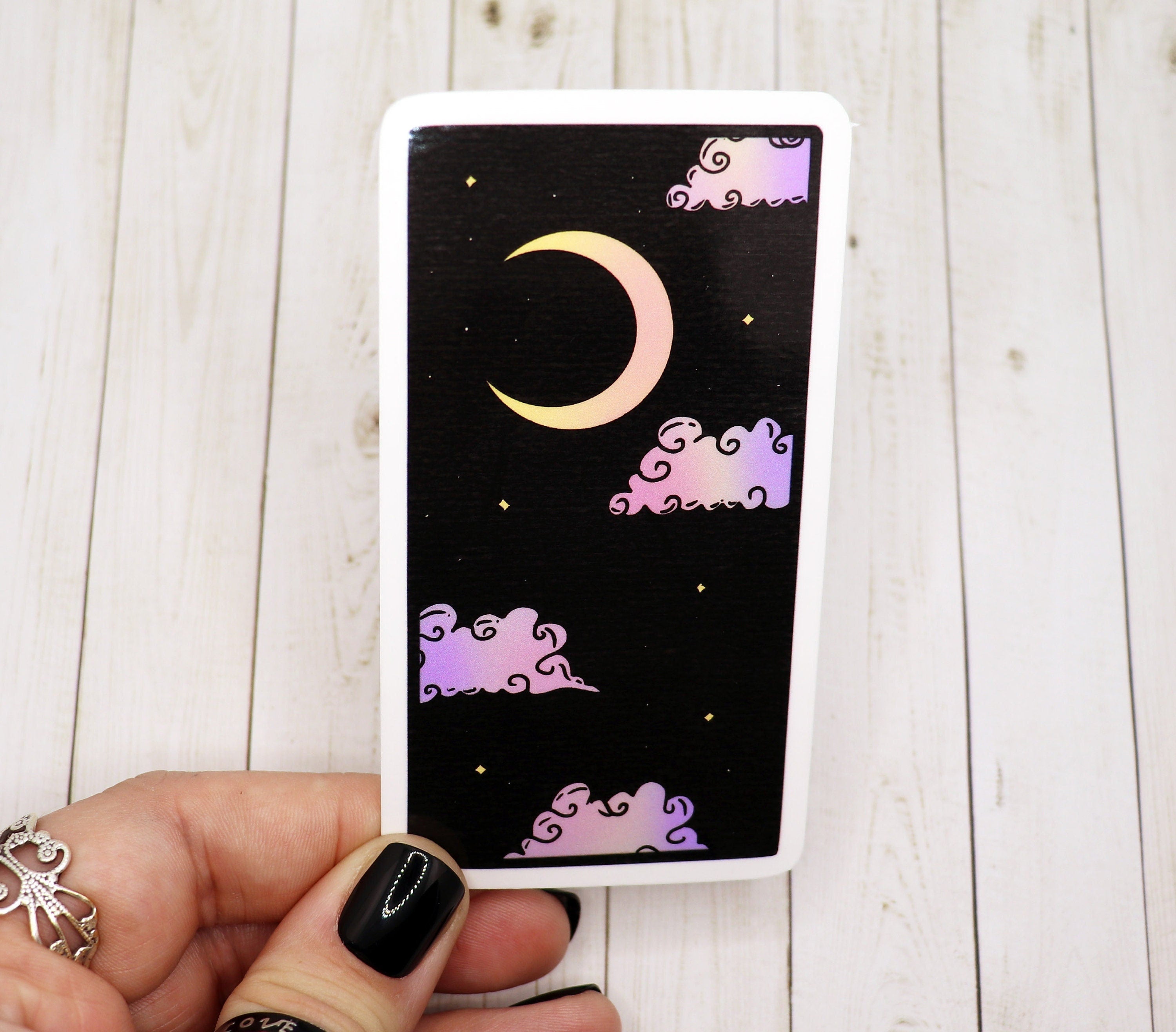 A beautifully designed rectangle moon sticker featuring a celestial theme, perfect for personalizing various items.