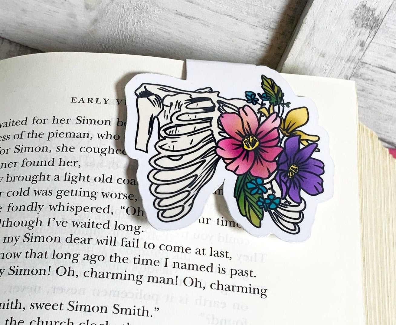 Ribcage with flowers magnetic bookmark featuring a unique design, double-sided, and strong magnets for holding multiple pages.