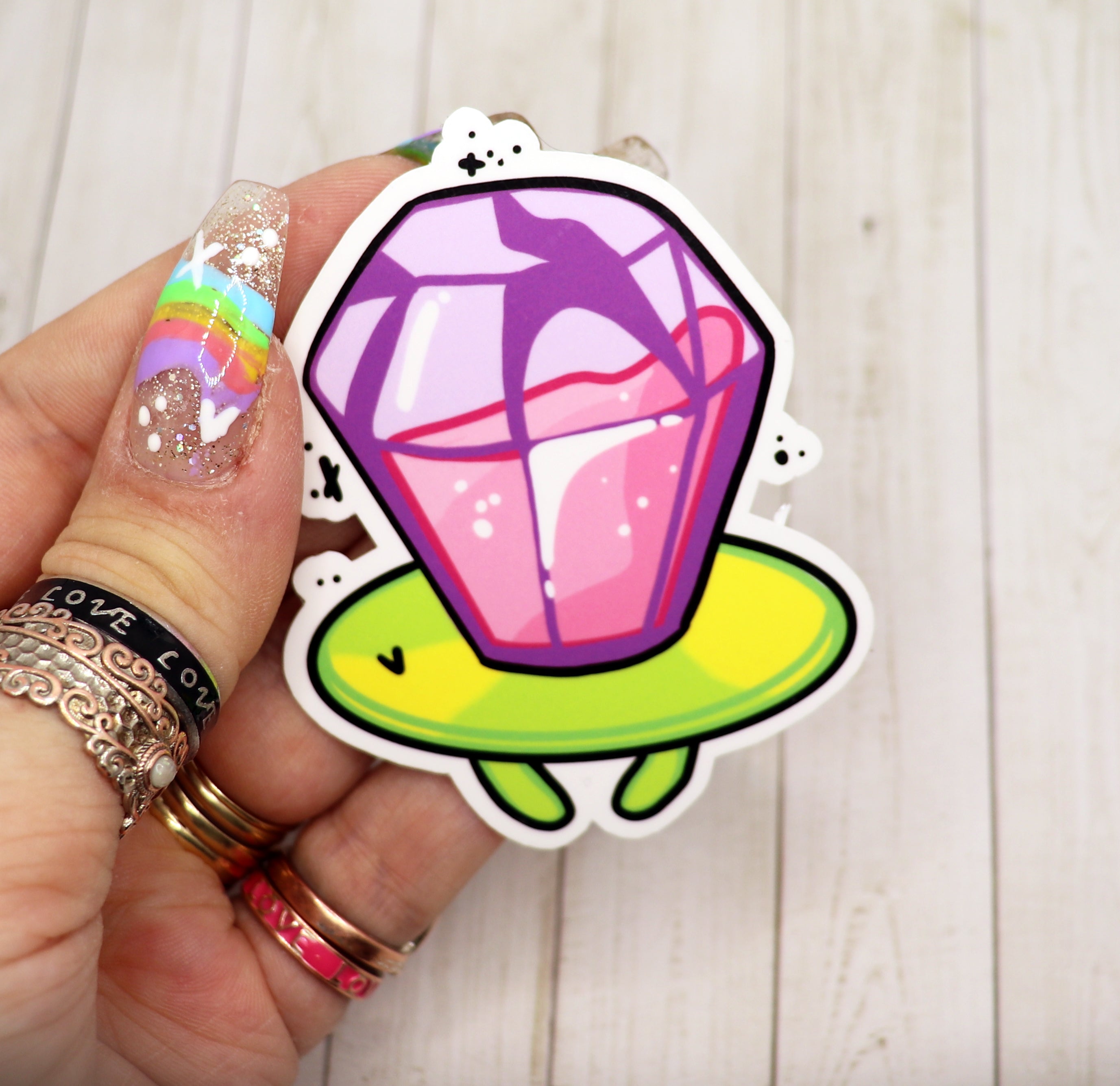 Colorful Ring Pop Vinyl Sticker on a white background, showcasing its vibrant design and matte finish.