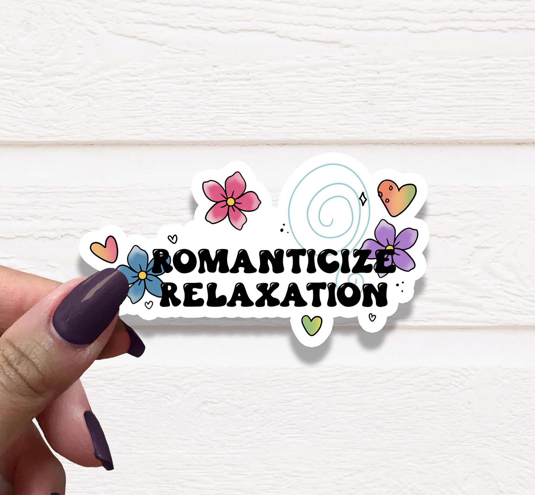 Romanticize Relaxation Vinyl Sticker on a white background, showcasing its matte finish and vibrant design.