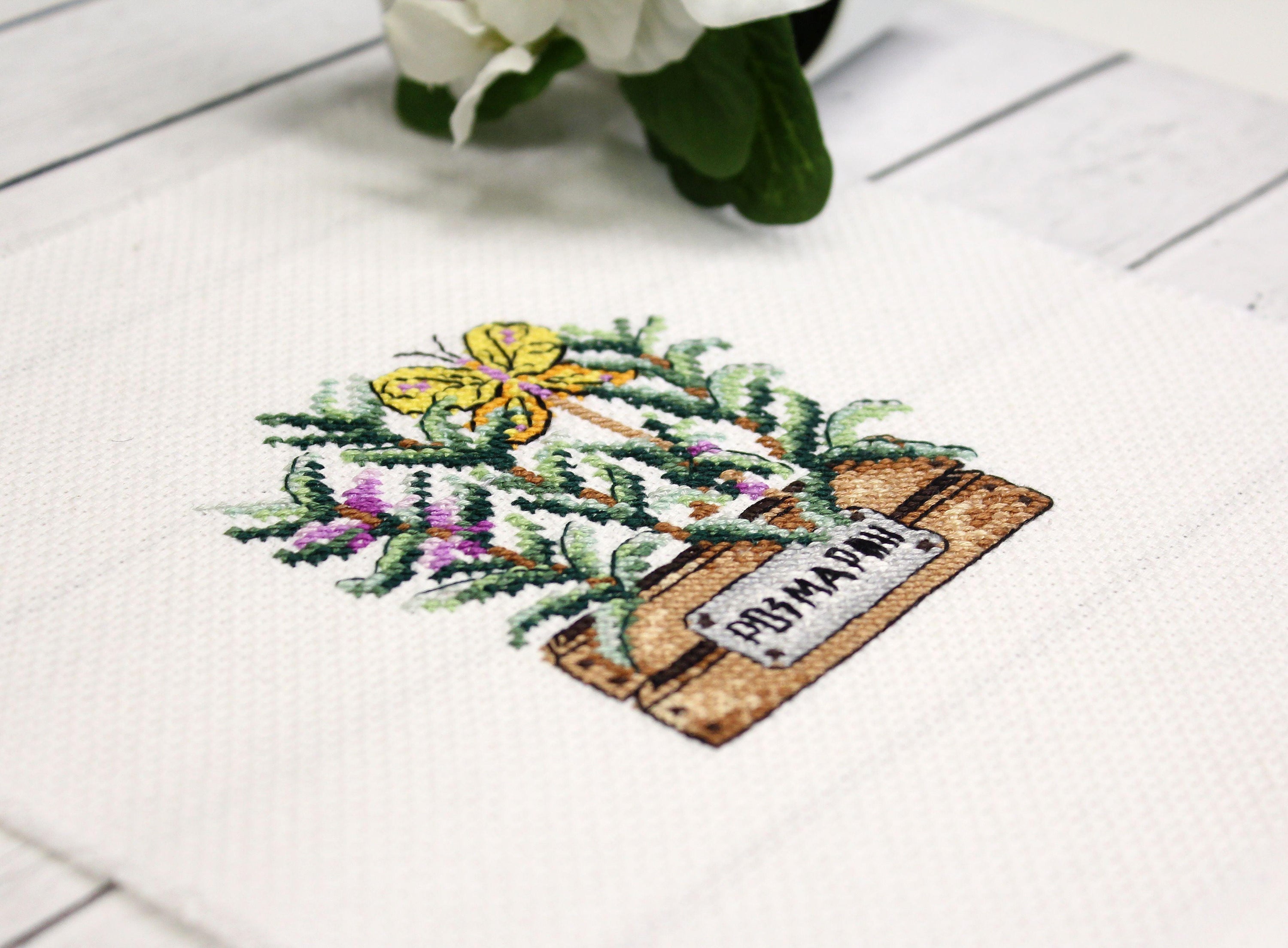 Rosemary SM-639 Counted Cross Stitch Kit featuring Aida canvas, colorful threads, and a black and white chart.