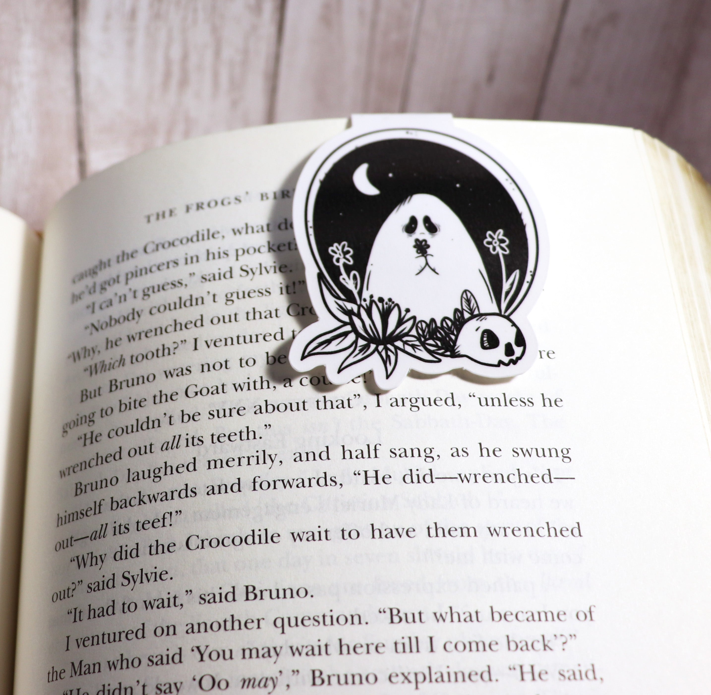 Sad Ghost Bookmark featuring a whimsical ghost design, double-sided, scratch and splash resistant, with strong magnets for secure page holding.