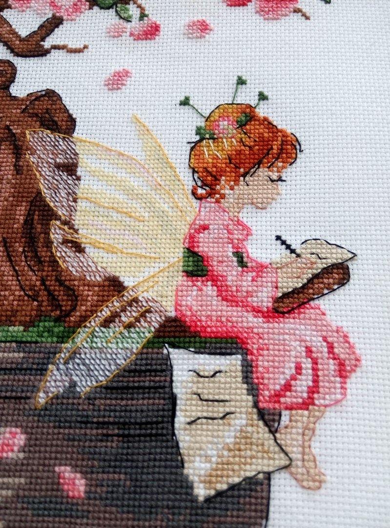 Sakura SNV-570 Counted Cross Stitch Kit featuring 18 count AIDA canvas, 24 colorful threads, and a needle, designed by Tatiana Kuzmina.