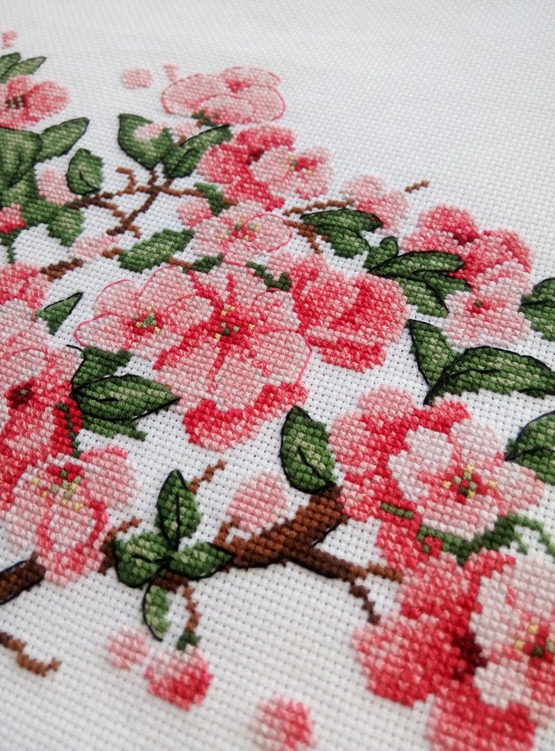 Sakura SNV-570 Counted Cross Stitch Kit featuring 18 count AIDA canvas, 24 colorful threads, and a needle, designed by Tatiana Kuzmina.