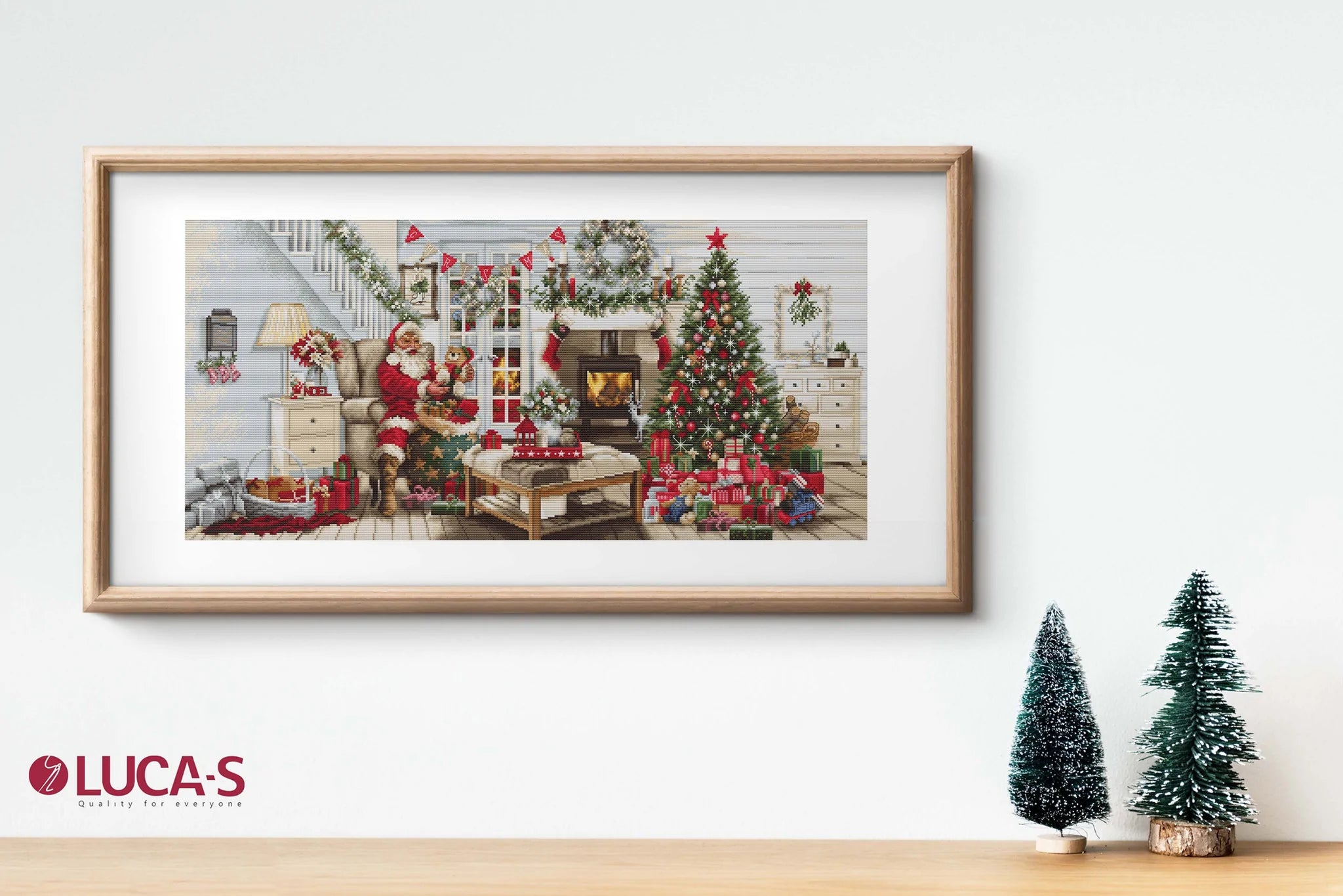 Santa interior B2408L counted cross-stitch kit with colorful threads and canvas.