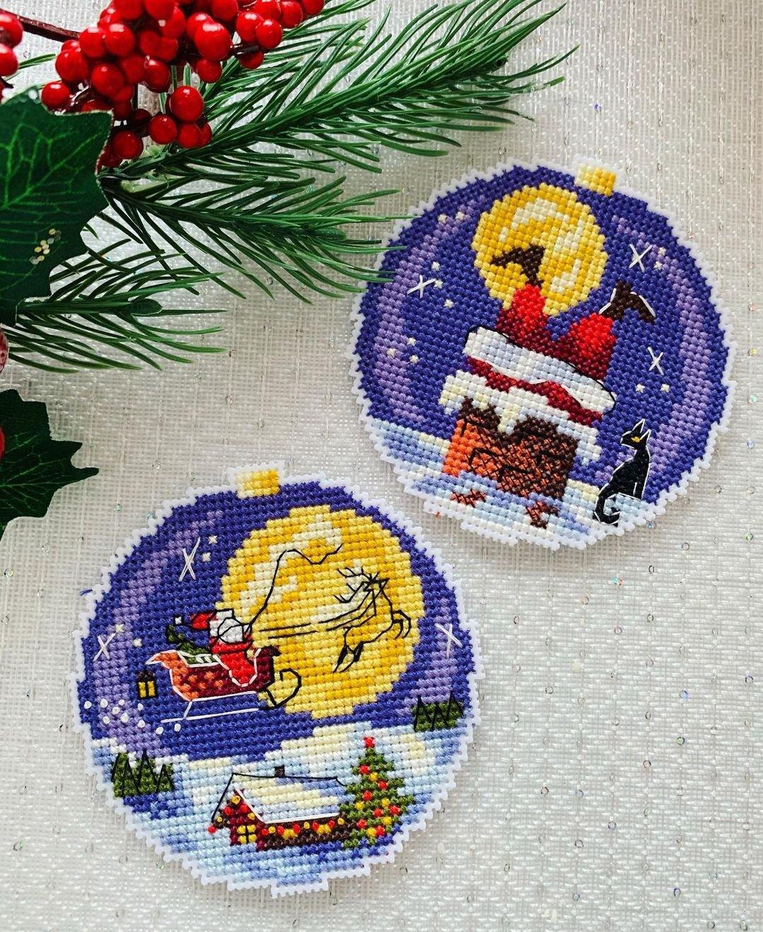 Santa SR-690 Plastic Canvas Counted Cross Stitch Kit with threads, needle, and instructions, featuring a colorful design.