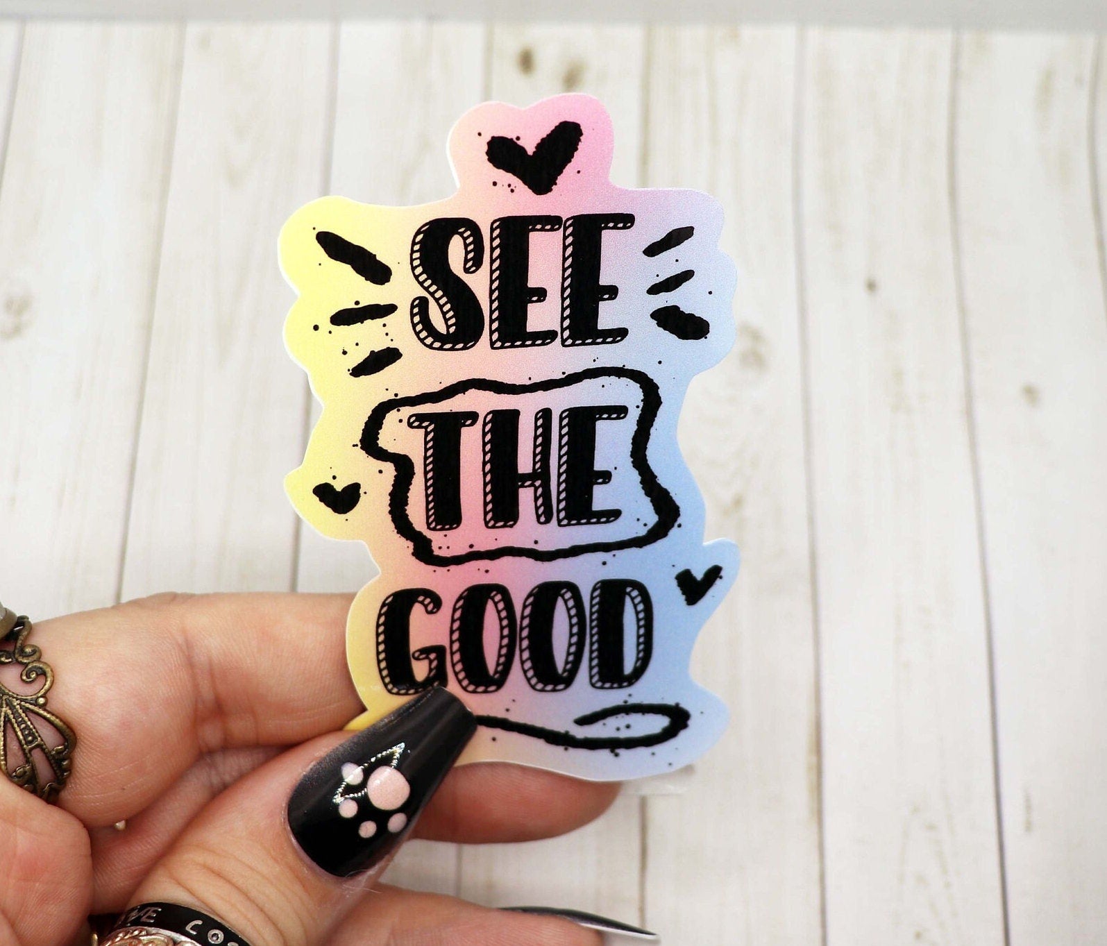 See the Good vinyl sticker on a white background, showcasing its vibrant colors and matte finish.