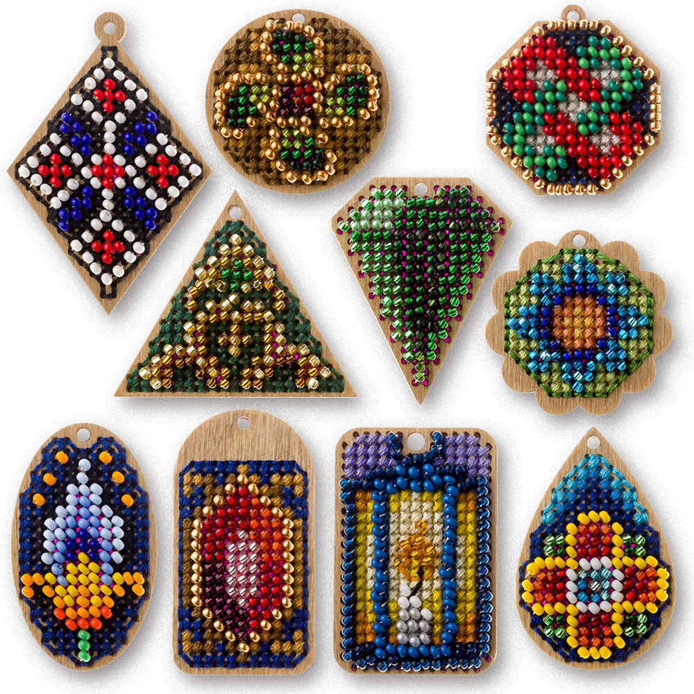 Set of 20 wooden embroidery blanks with intricate designs, perfect for creative needlework projects.