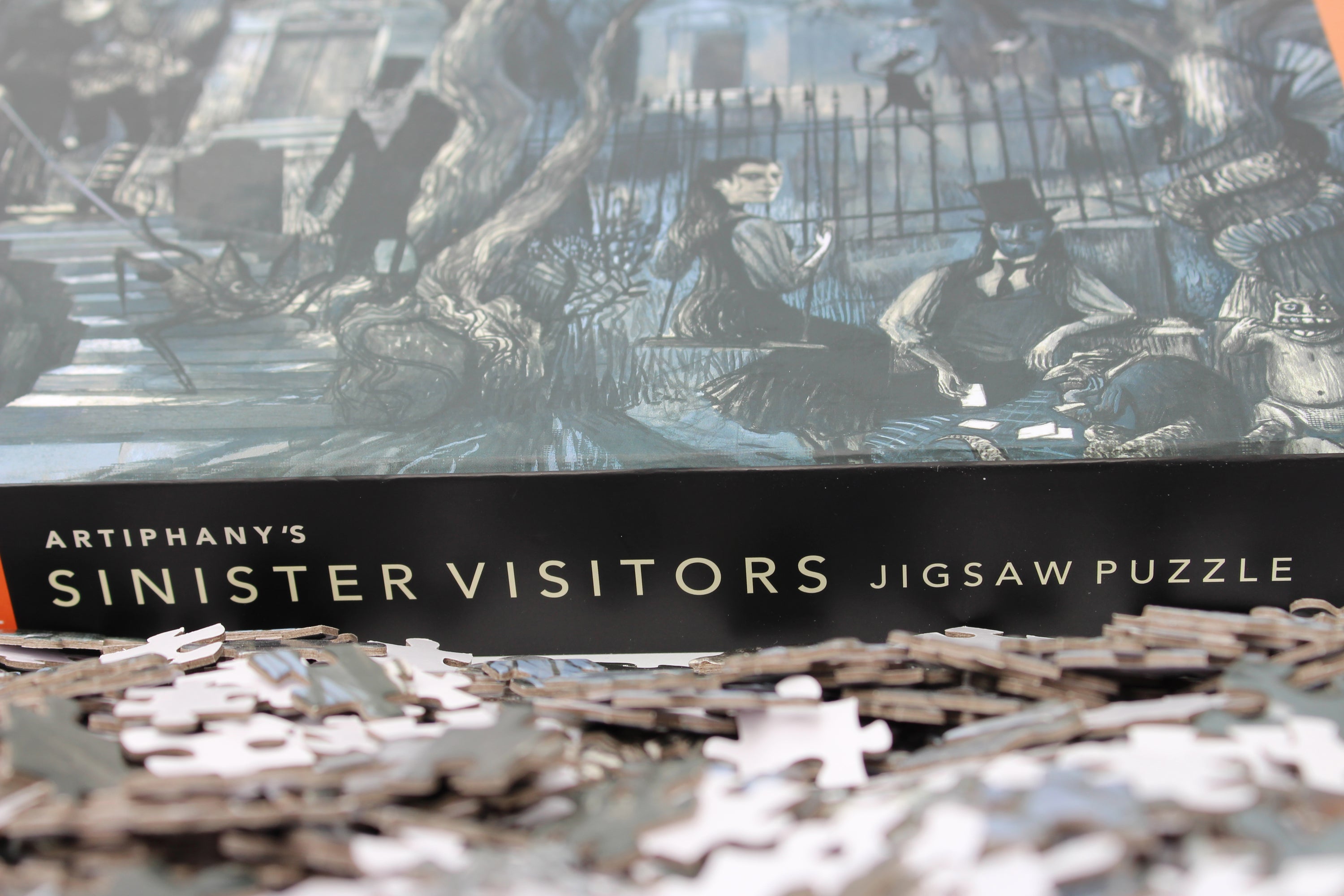 Sinister Visitors jigsaw puzzle featuring eerie characters like spectres and skeletons, beautifully illustrated and ready for assembly.