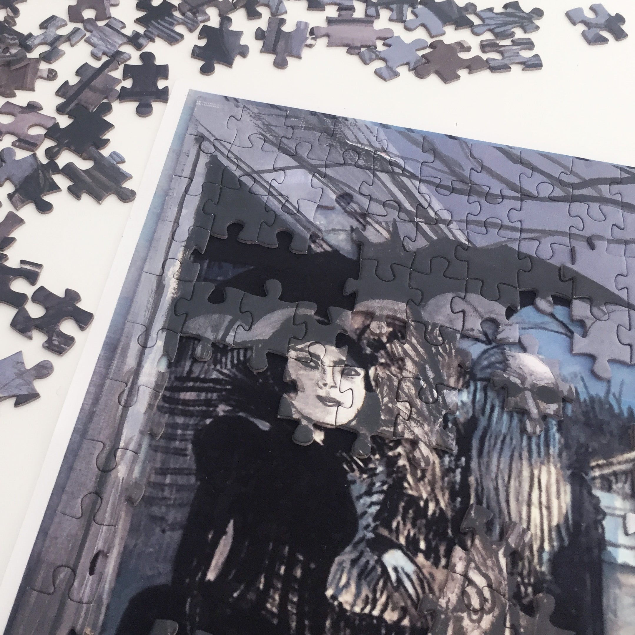 Sinister Visitors jigsaw puzzle featuring eerie characters like spectres and skeletons, beautifully illustrated and ready for assembly.