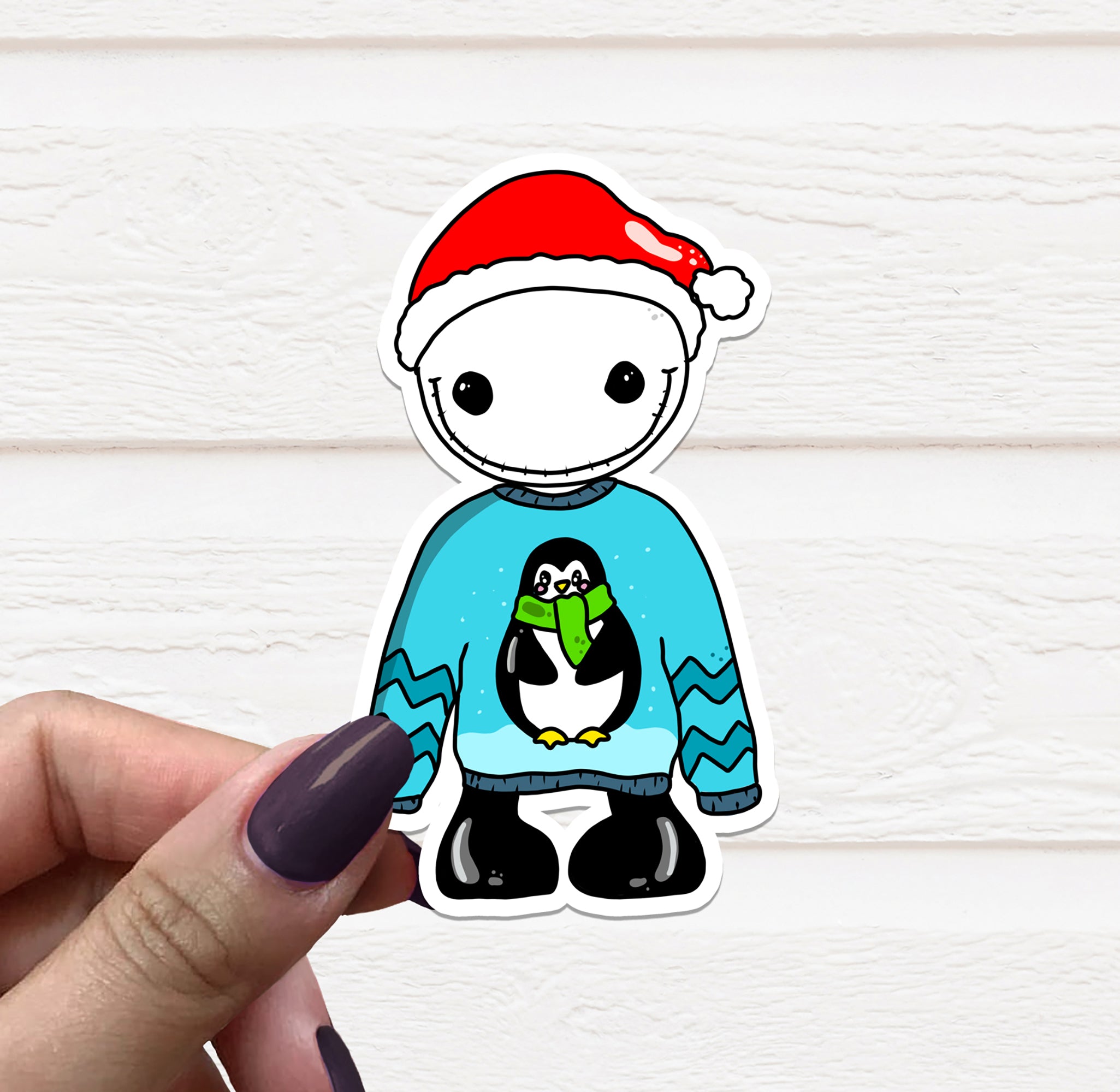 A colorful vinyl sticker featuring a skeleton wearing an ugly Christmas sweater, perfect for festive decorations.