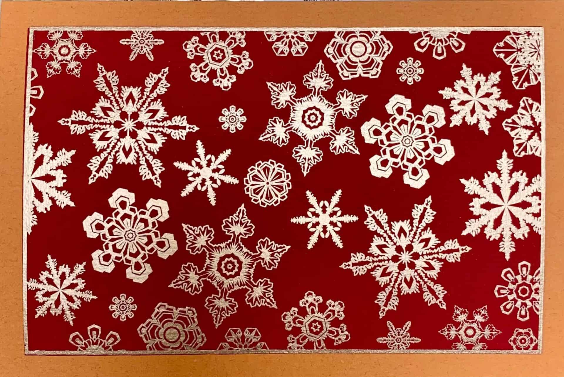 A collection of handmade SNOWFLAKE greeting cards featuring unique textures and vintage designs, accompanied by vanilla envelopes.