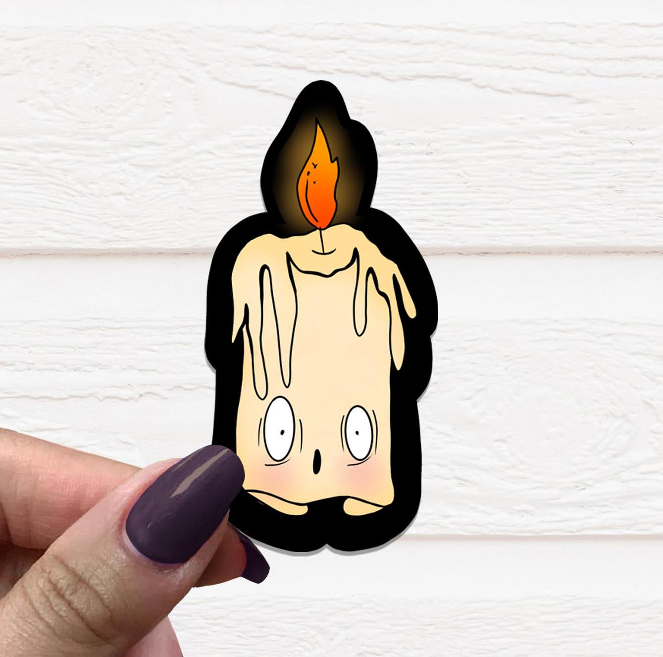 Spooky Candle Boy Vinyl Sticker featuring a whimsical candle character with a spooky design, perfect for personalizing items.