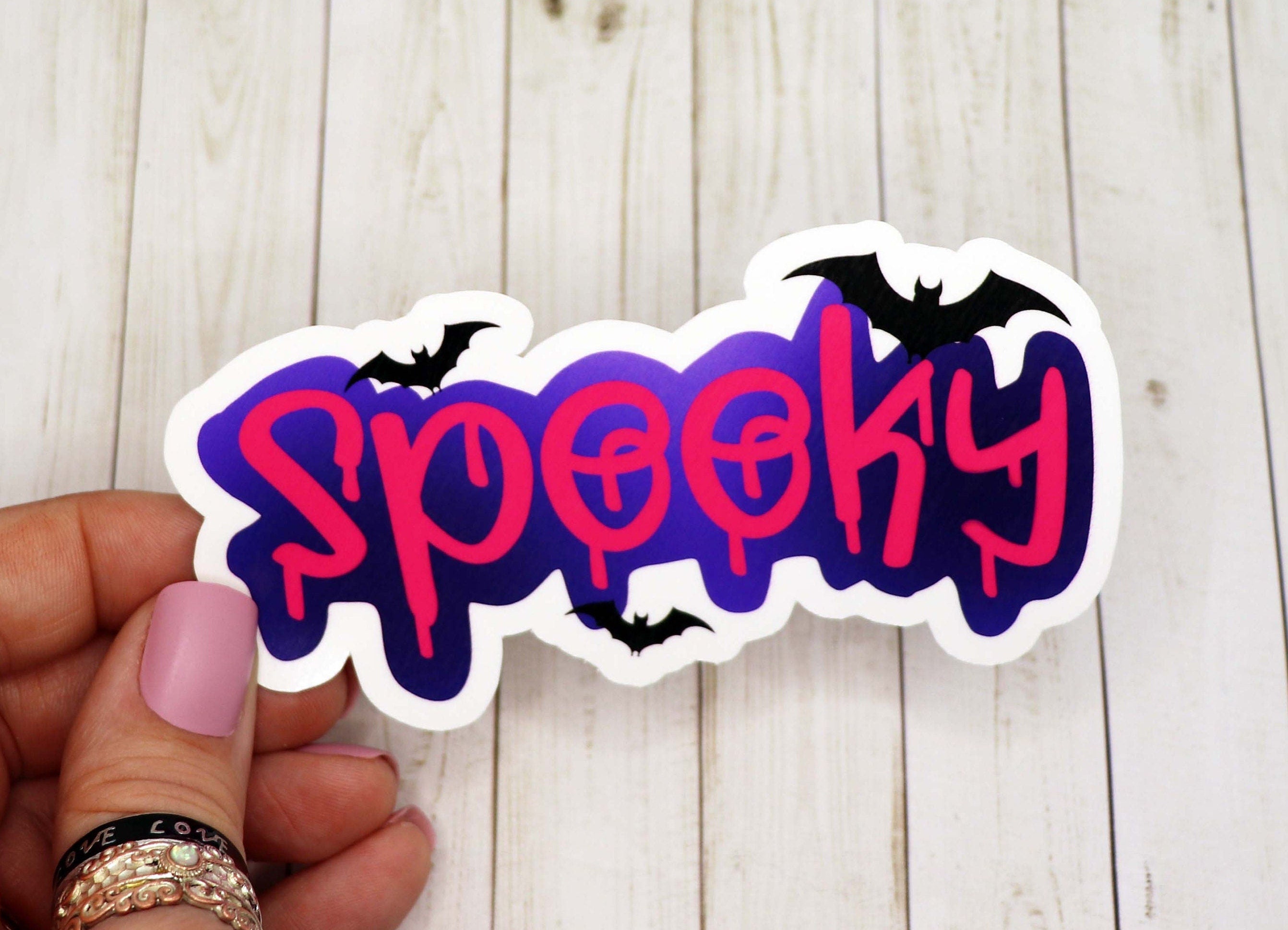 A spooky vinyl sticker featuring a fun Halloween design, measuring 3 inches, perfect for personalizing various items.