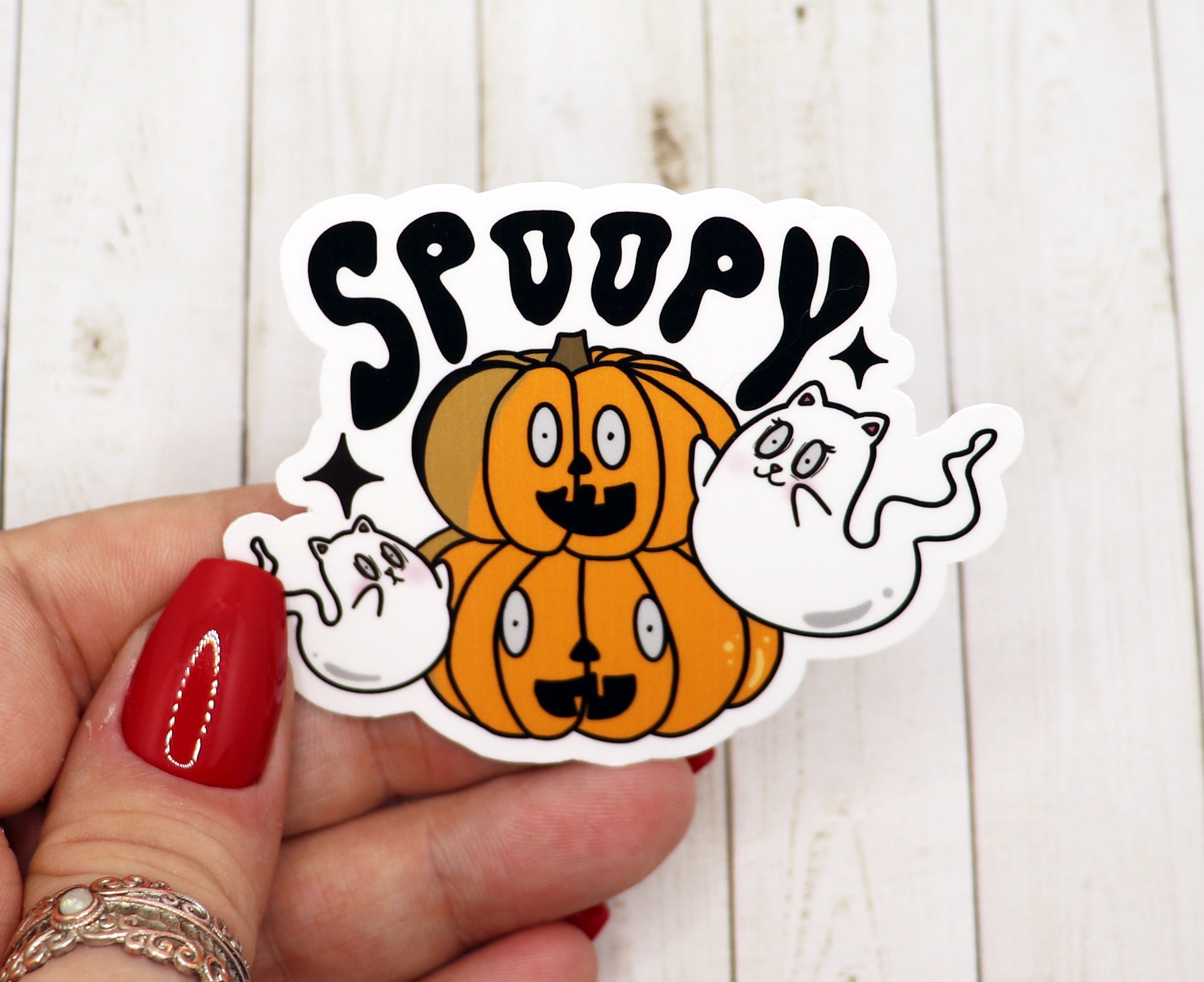 A vibrant Spoopy Halloween Vinyl Sticker featuring spooky designs, perfect for decorating various items.