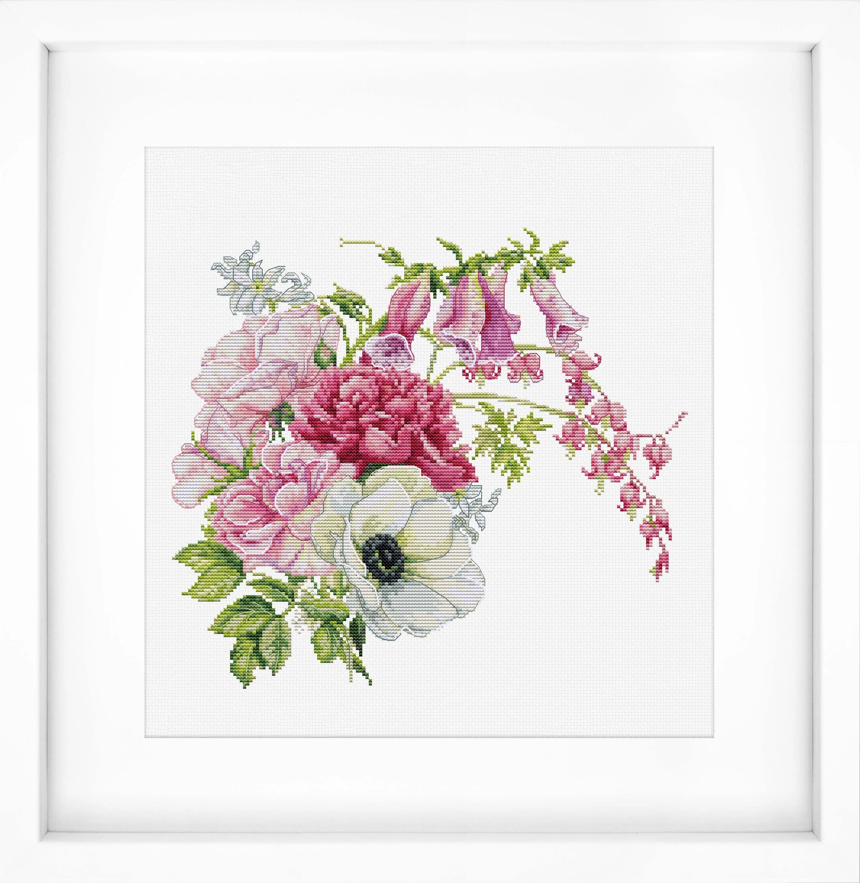 Spring Bouquet B7018L Counted Cross-Stitch Kit featuring colorful threads, canvas, and needle for crafting.