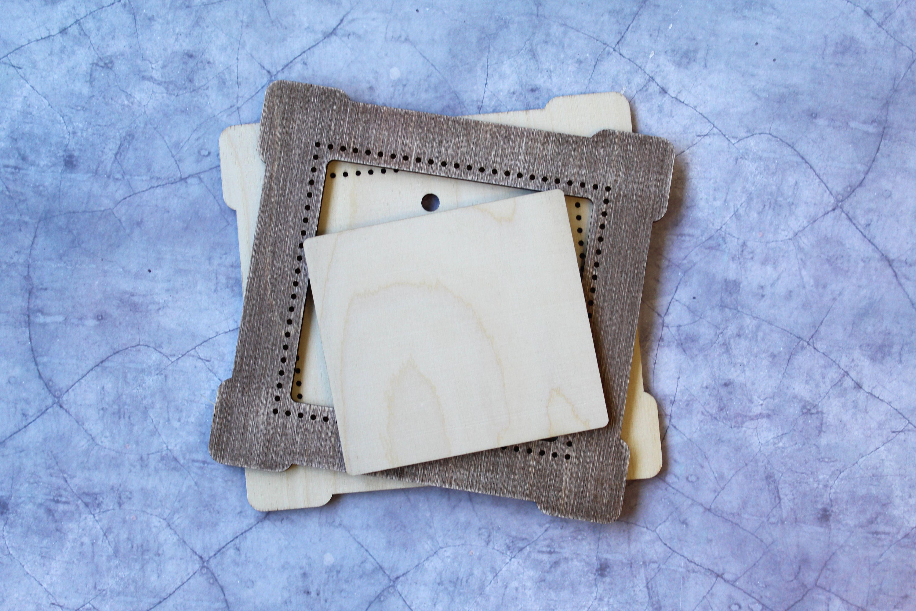 Square Frame Brown OP-263 made of plywood, ideal for cross stitch projects, featuring holes for easy fabric stretching.