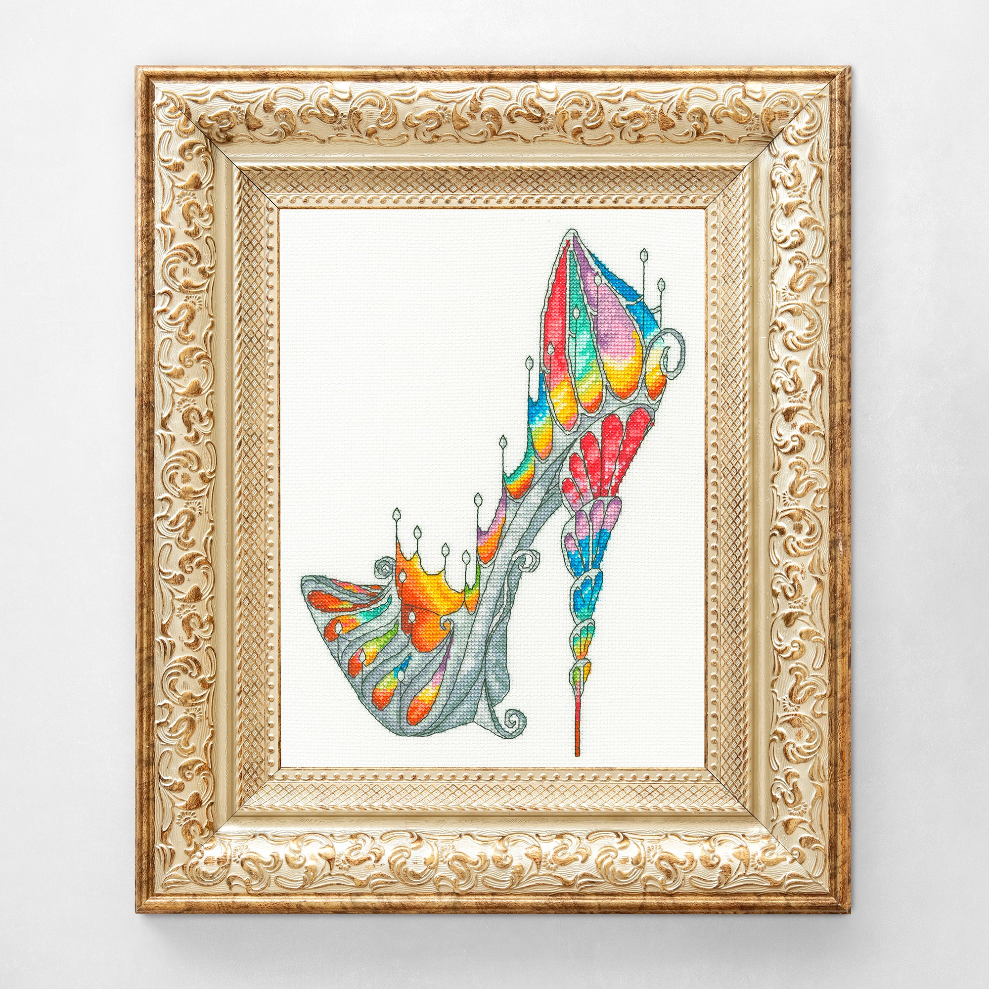 Stained Glass Slipper XSK7 Counted Cross Stitch Kit with fabric, threads, needle, and instructions displayed together.