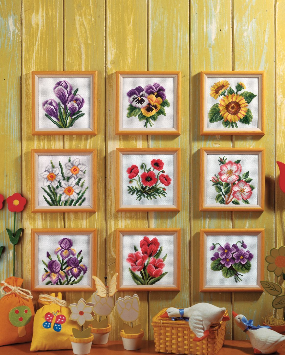 Stamped Cross Stitch Kit 'Crocuses' featuring printed Aida fabric, 9 colors of cotton, and included needle and instructions.