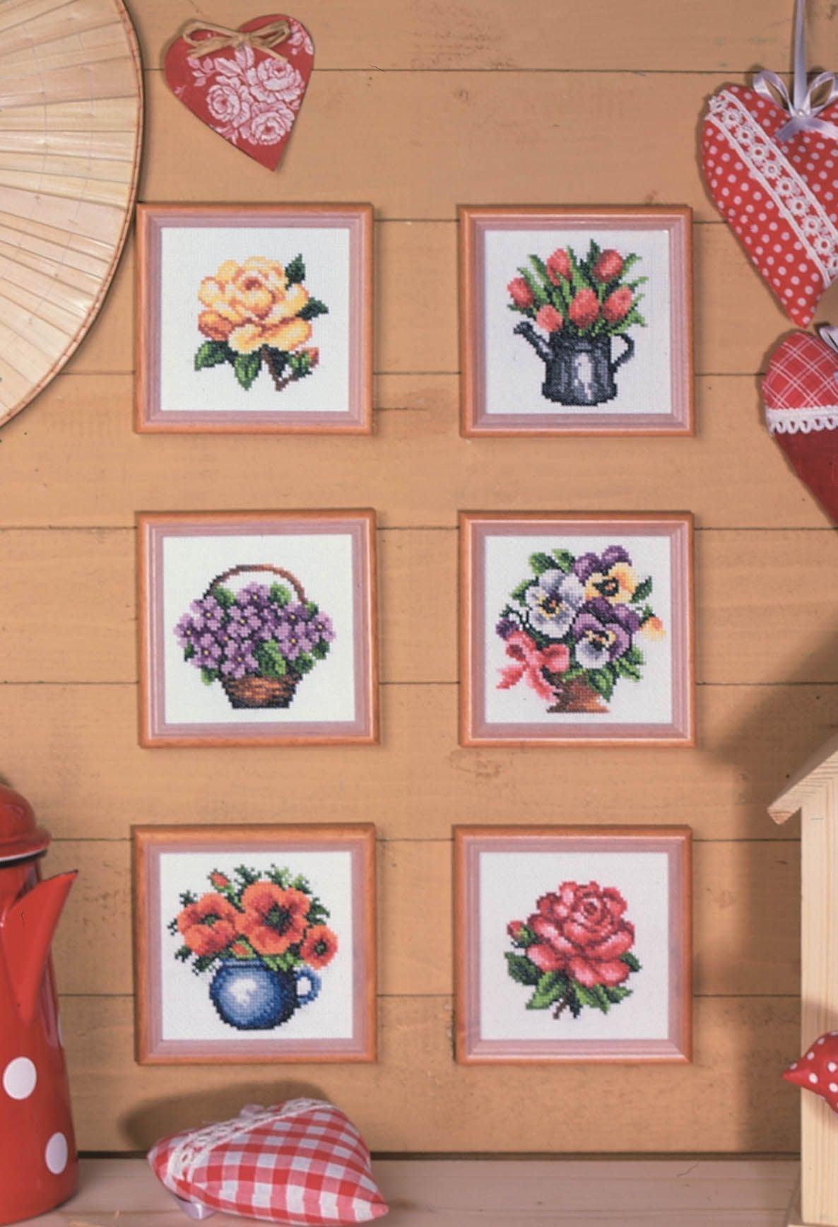 Stamped Cross Stitch Kit 'Pansies' featuring printed Aida fabric, vibrant threads, and included needle and instructions.