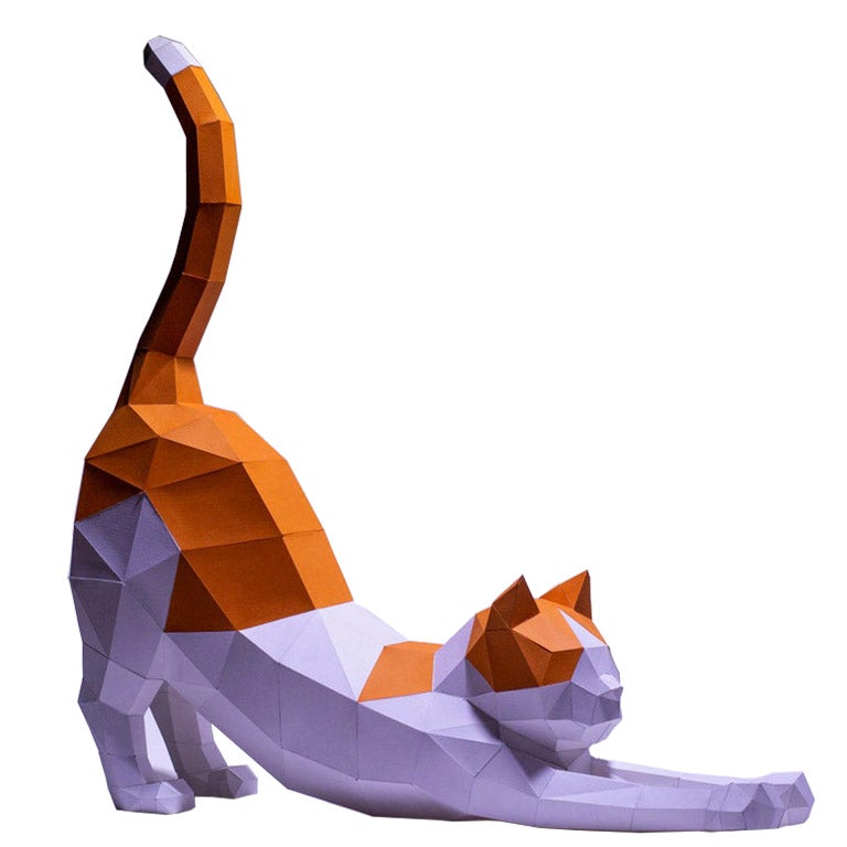 A colorful 3D paper model of a stretching cat, showcasing its playful pose and intricate design, made from recycled materials.